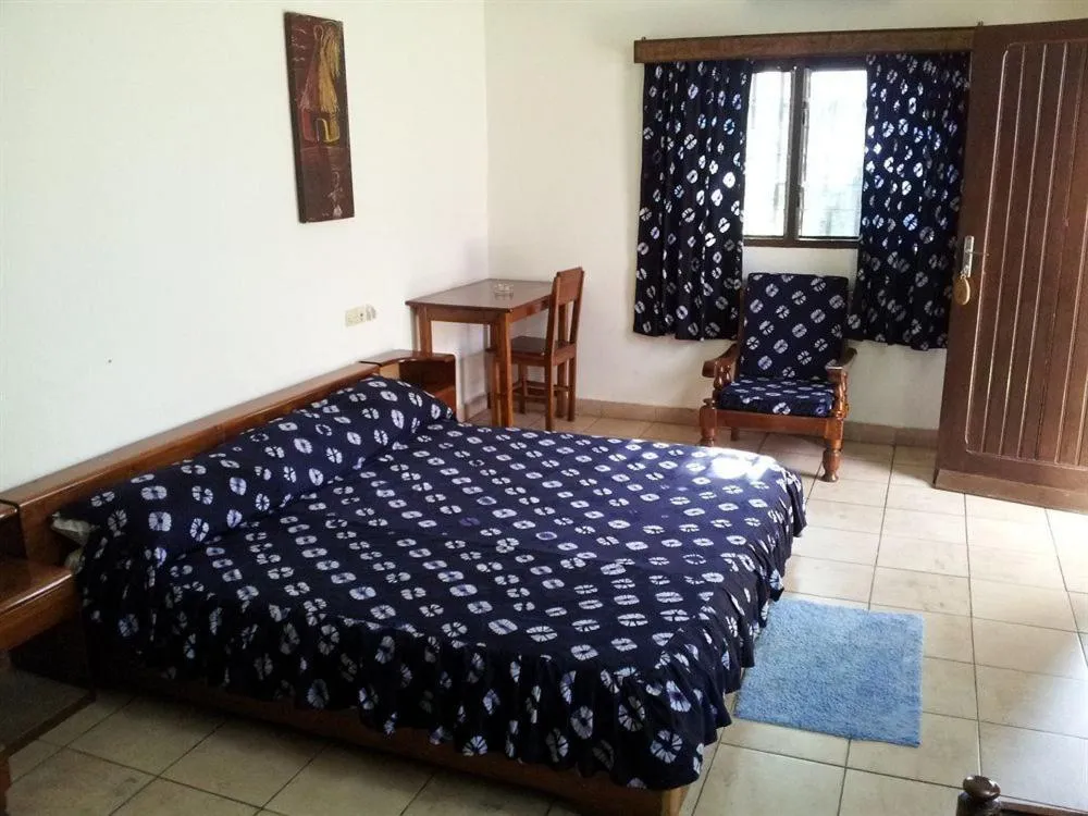 Photo of the whole room, Bed in Hotel Aurore Lomé