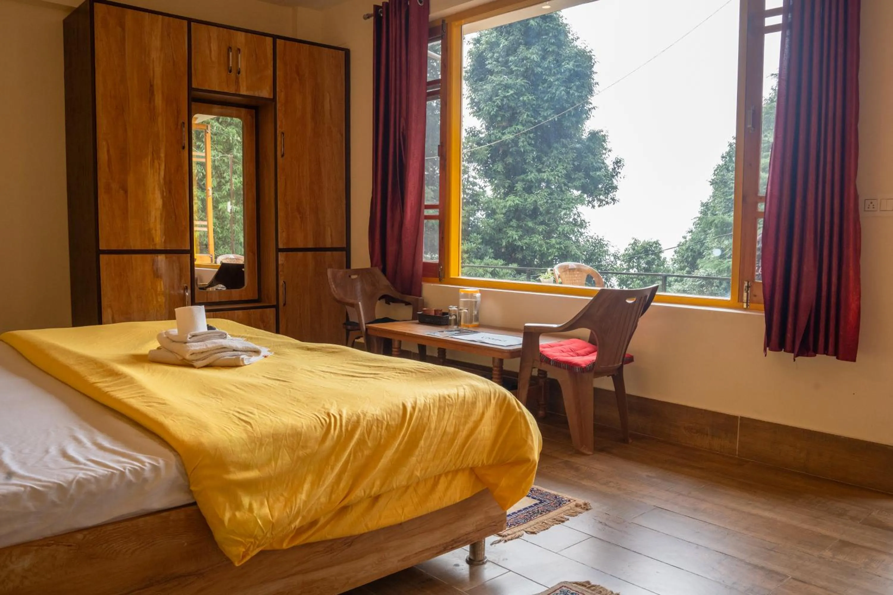 Photo of the whole room, Bed in The Unmad - Dharamkot