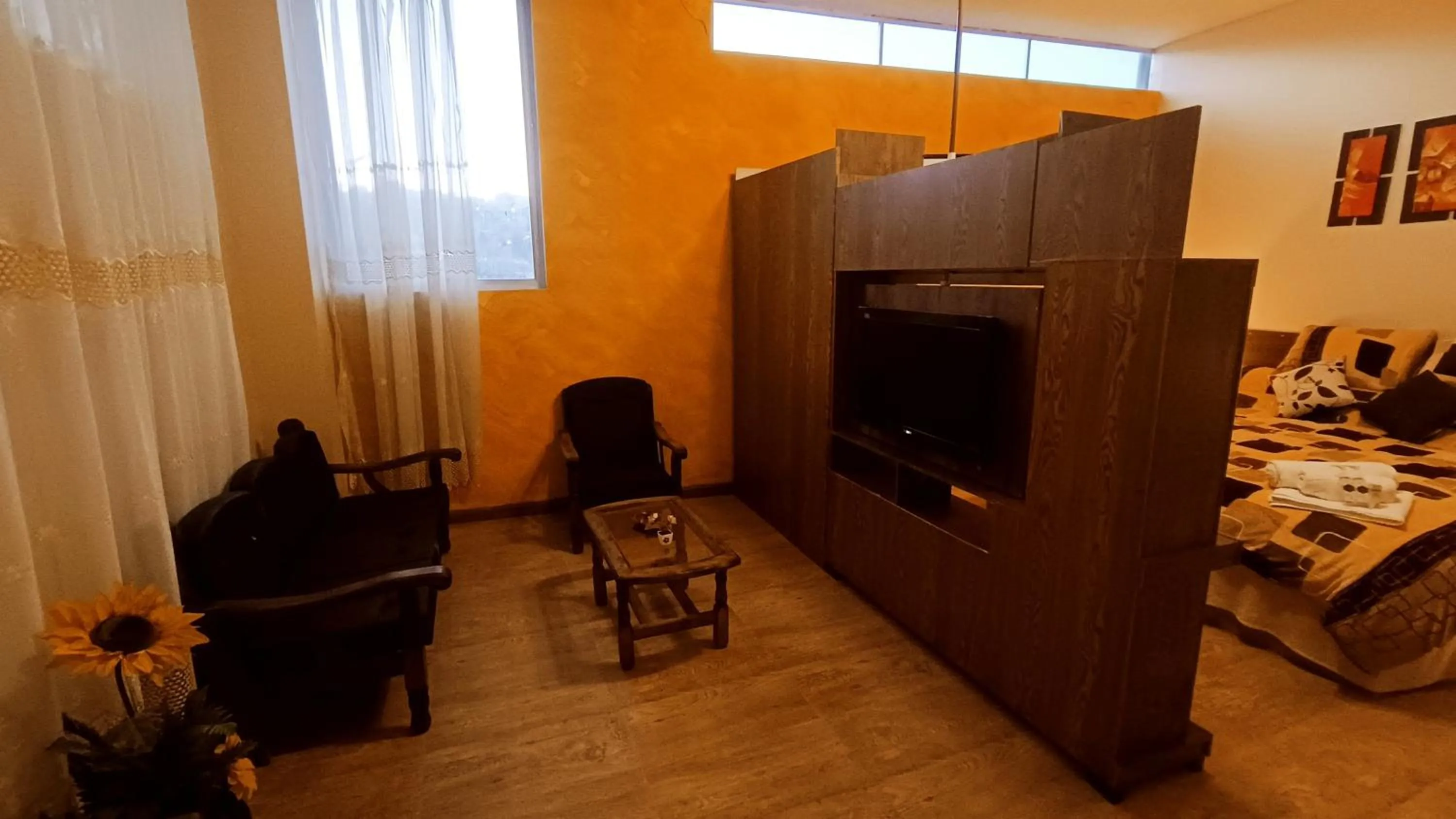 Seating area, Bed in Hotel Gran Aurum