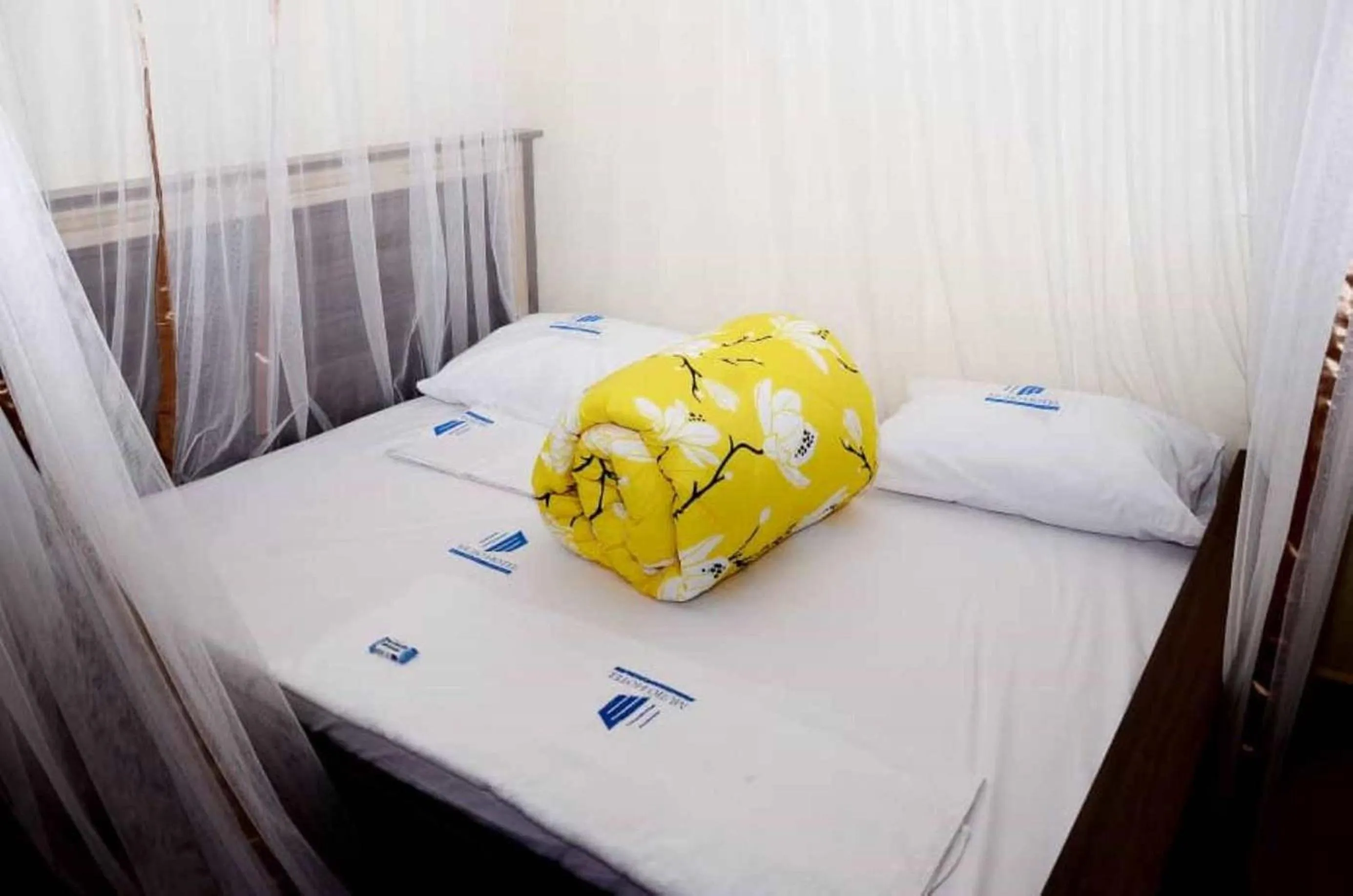 Bed in Mujjo Hotel Kajjansi