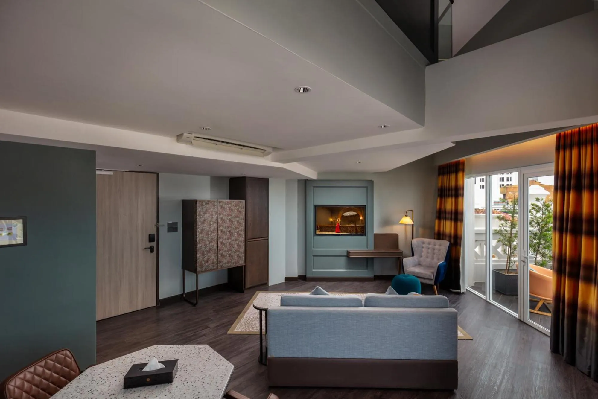 Living room in The George Penang by The Crest Collection