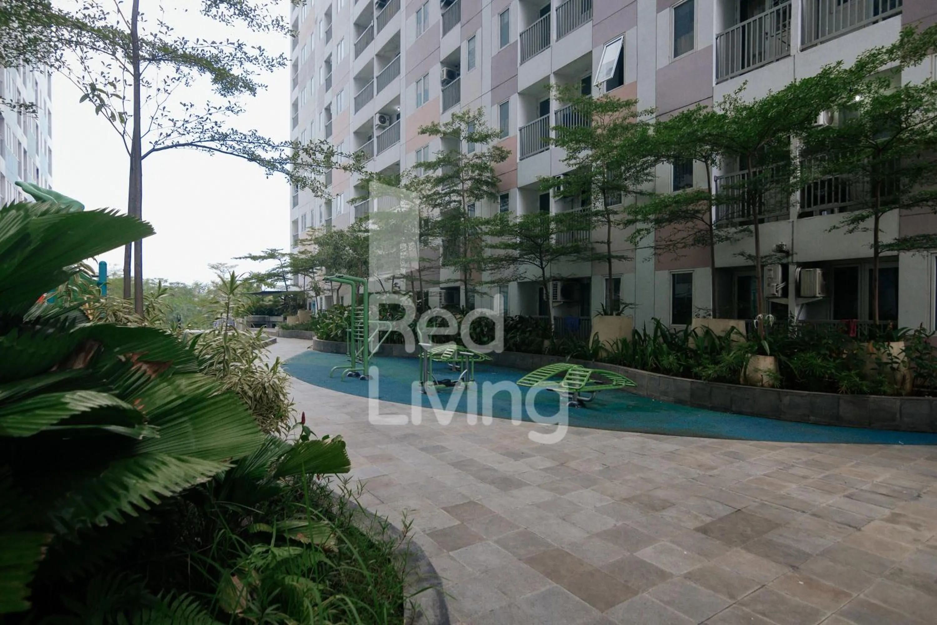 Property building in Redliving Apartemen Grand Sentraland - AT Properti Tower Pink