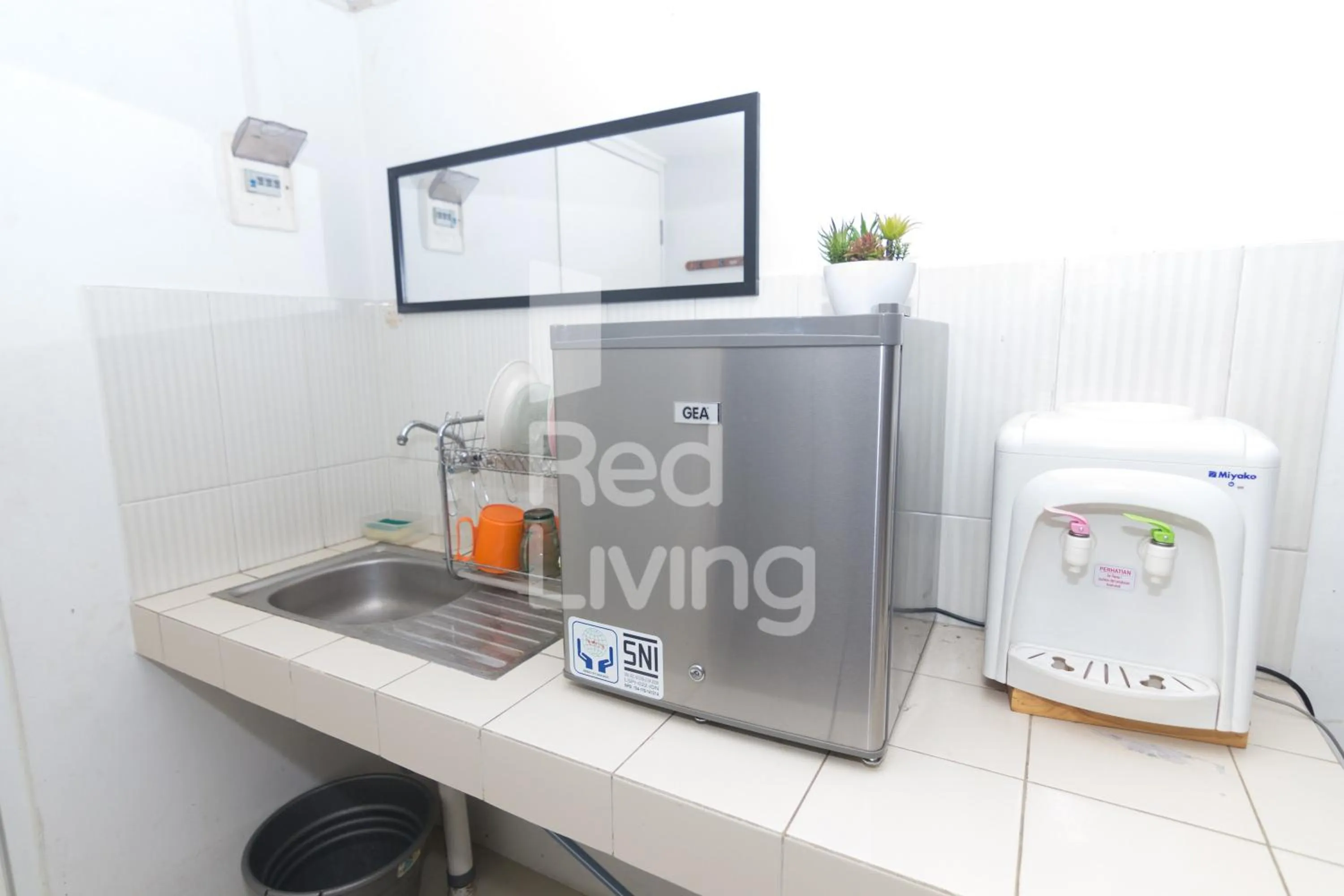 Kitchen or kitchenette in Redliving Apartemen Grand Sentraland - AT Properti Tower Pink