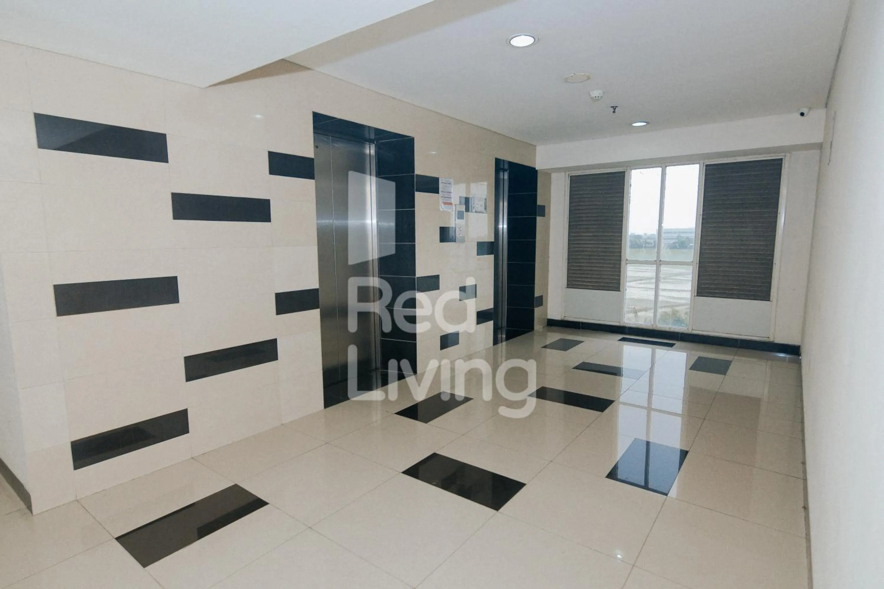 Property building in Redliving Apartemen Grand Sentraland - AT Properti Tower Pink