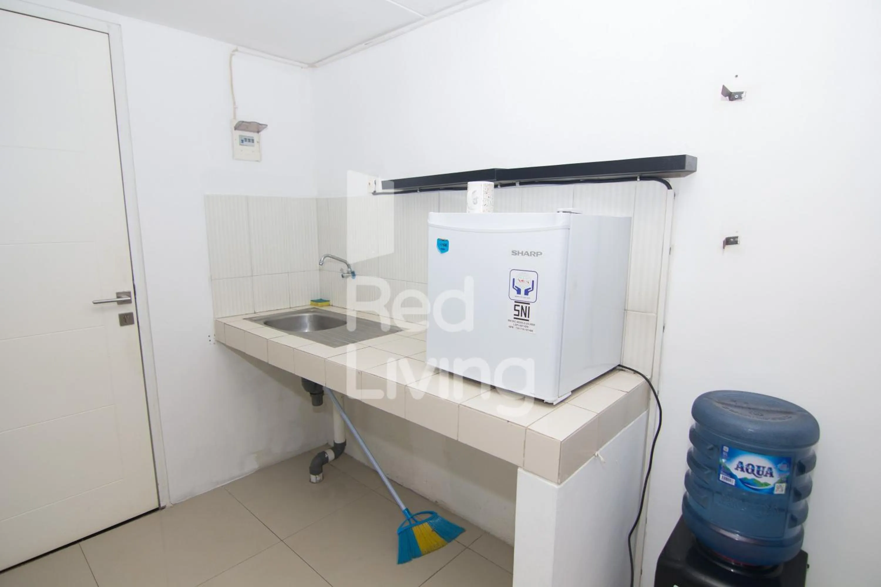 Kitchen or kitchenette in Redliving Apartemen Grand Sentraland - AT Properti Tower Pink