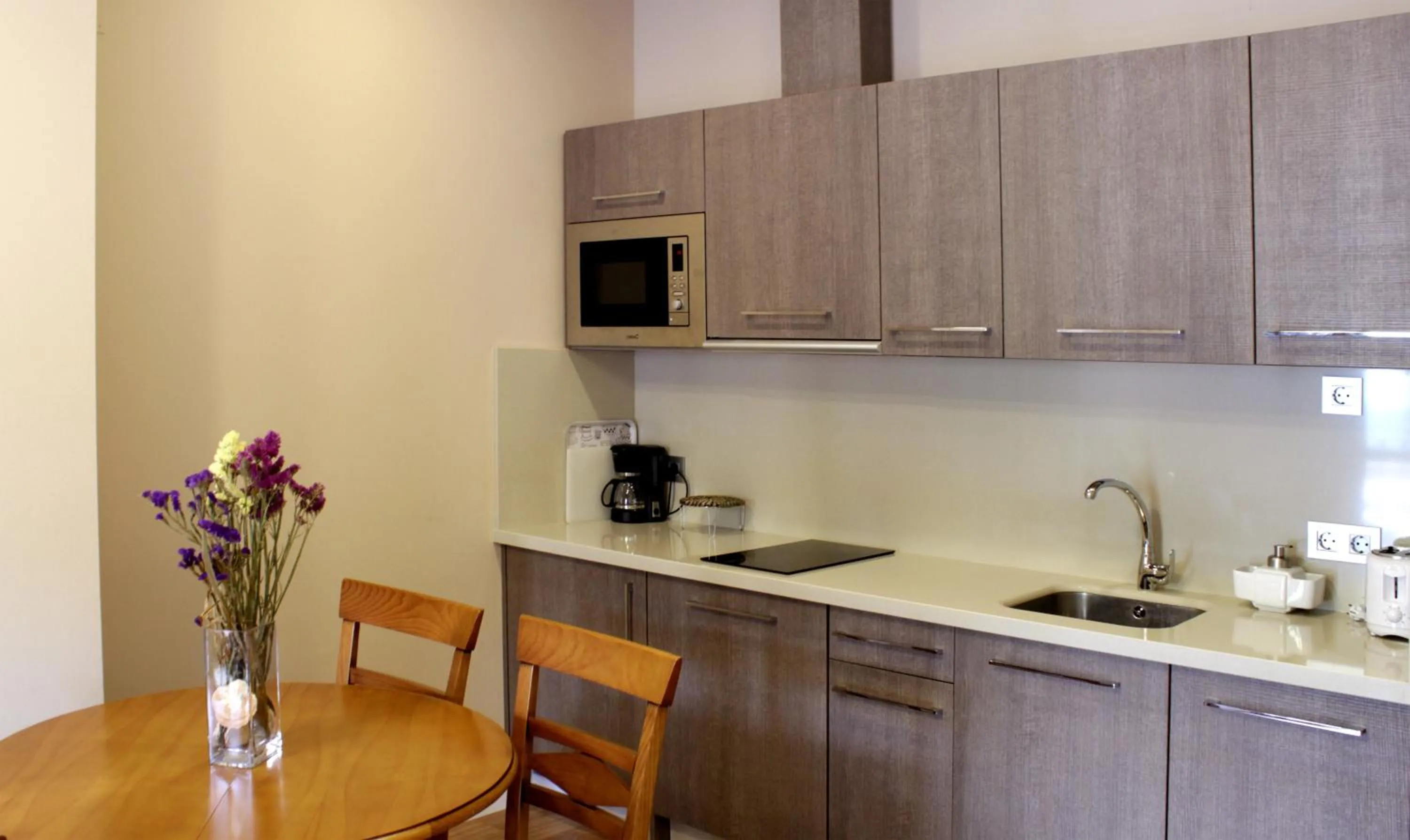Kitchen or kitchenette in SEVITUR Seville Comfort Apartments