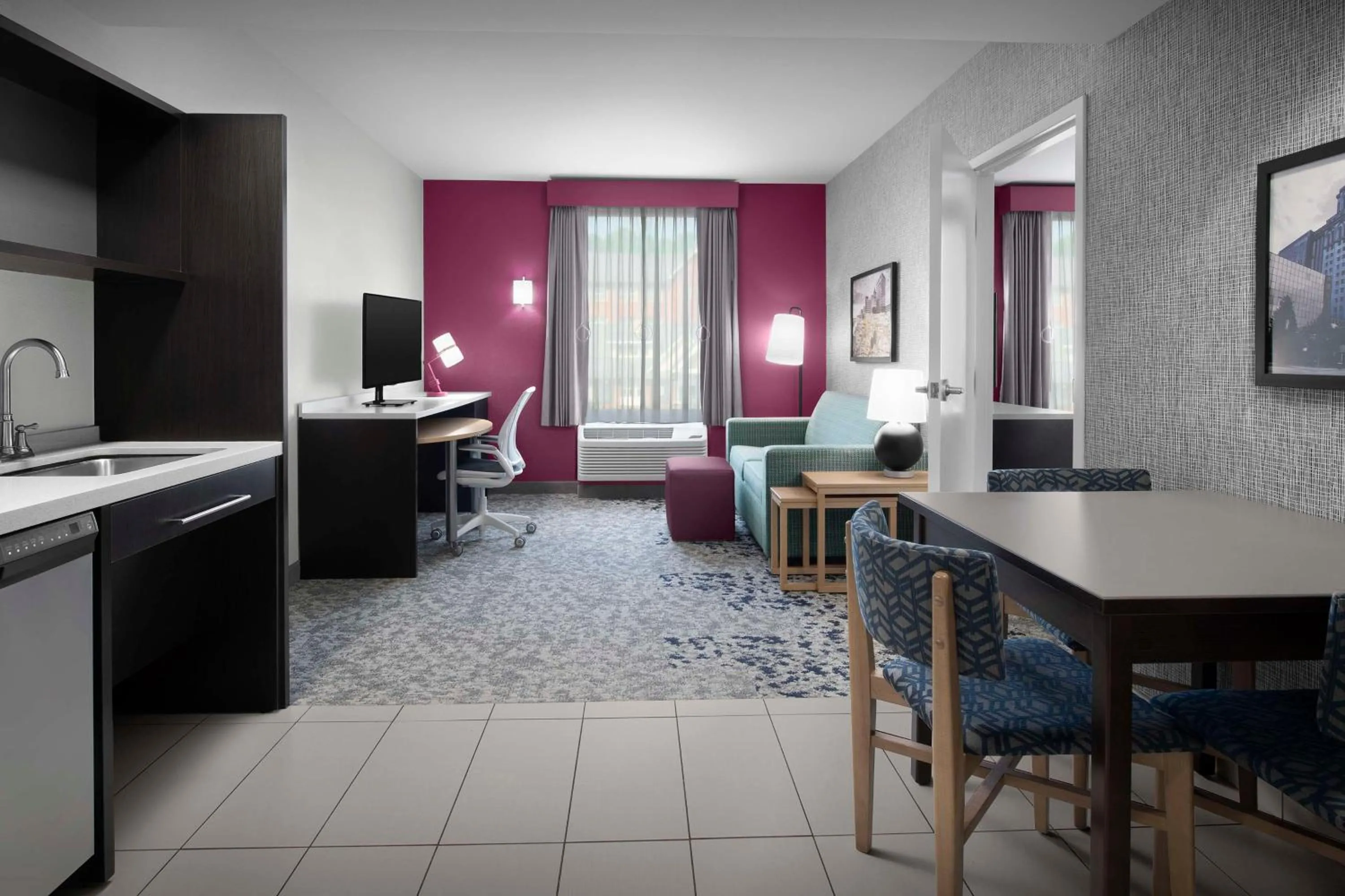 Living room in Home2 Suites by Hilton Greensboro Airport, NC