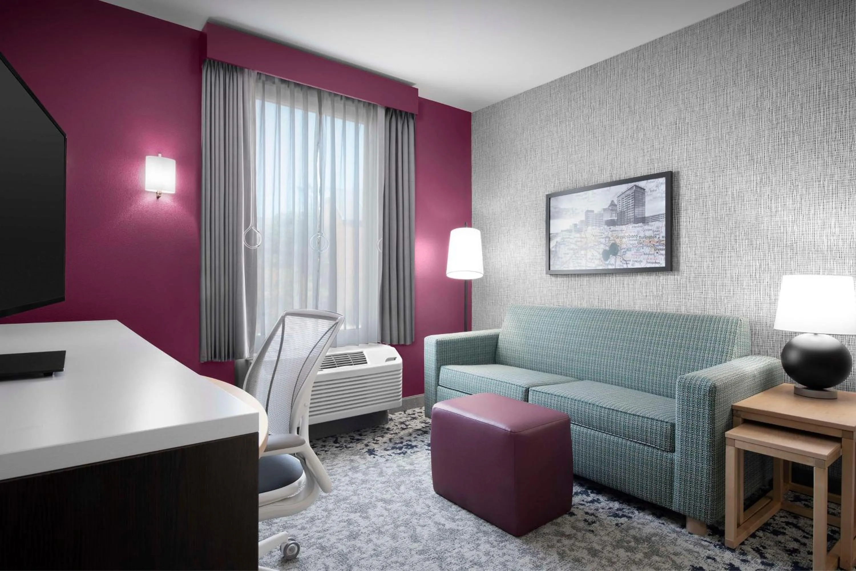 Living room in Home2 Suites by Hilton Greensboro Airport, NC