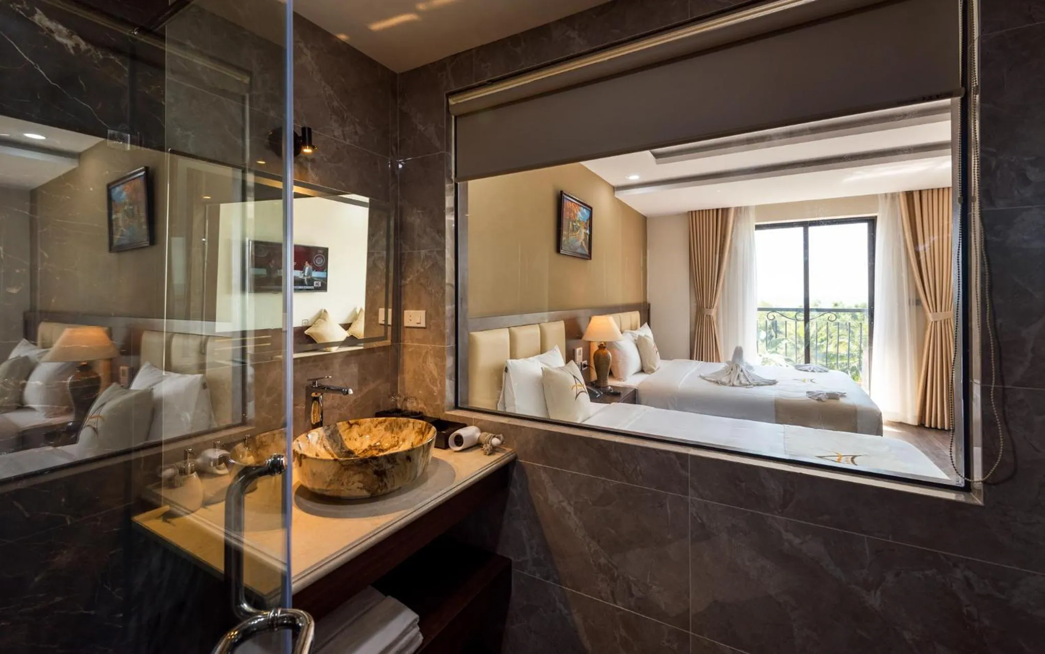 Bathroom, Bed in Aquasun Hotel Phu Quoc