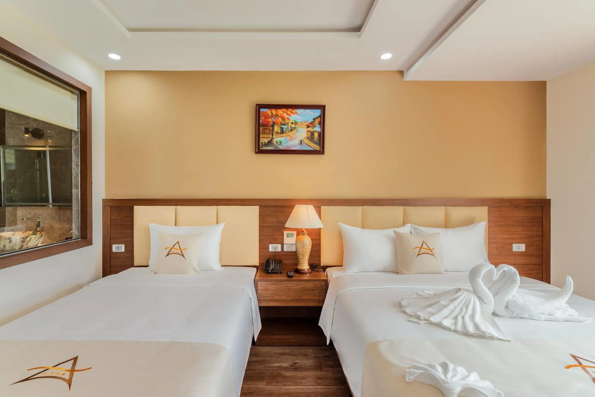 Bed in Aquasun Hotel Phu Quoc