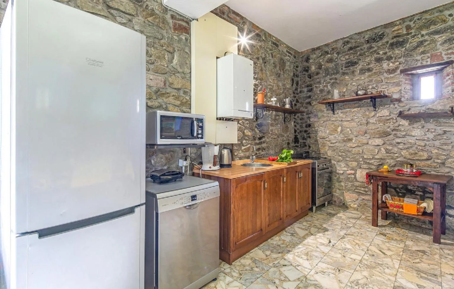 Kitchen or kitchenette in Casale il Gelso by VacaVilla