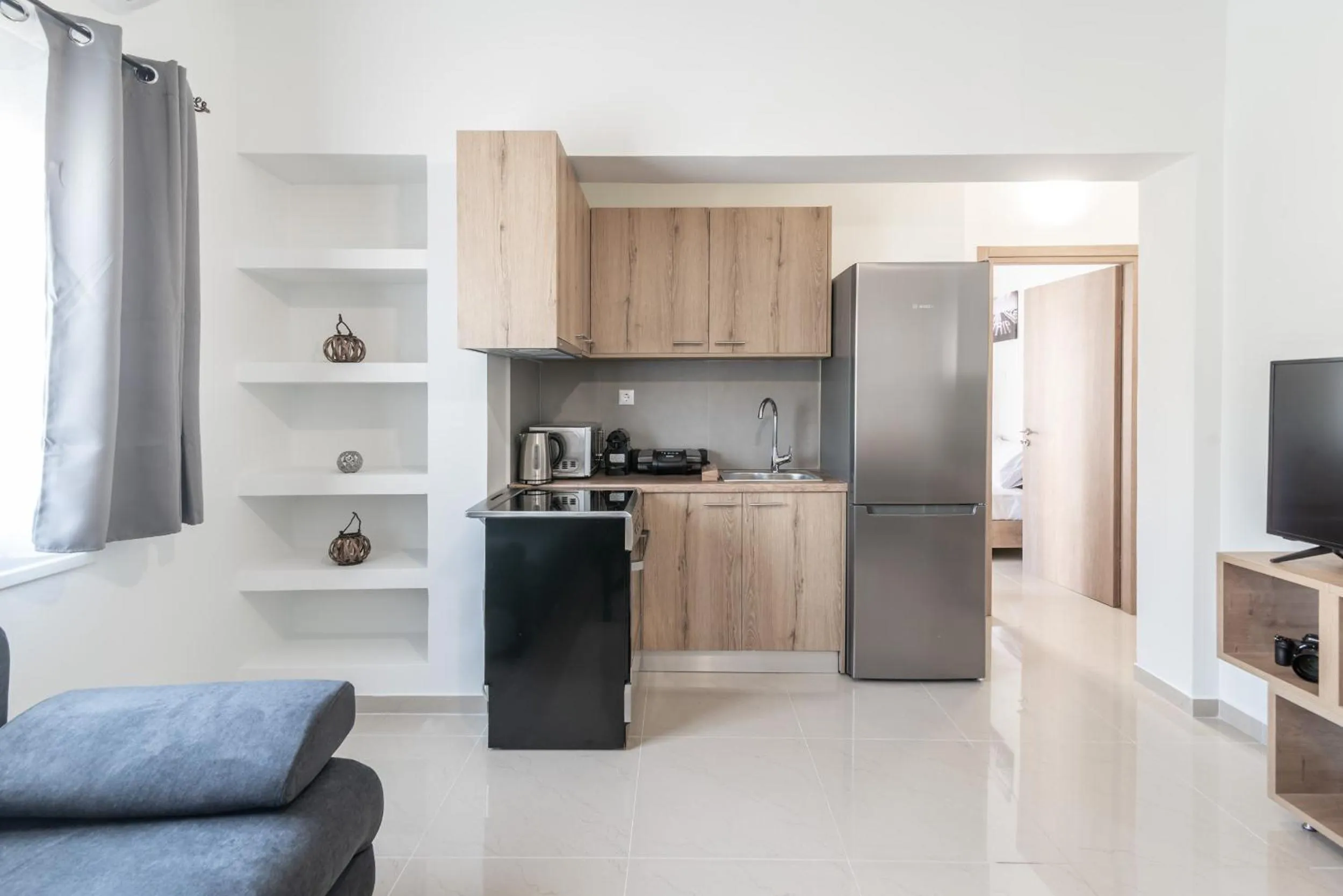 Communal kitchen in Blue Riviera villas & suites - Alimos 2