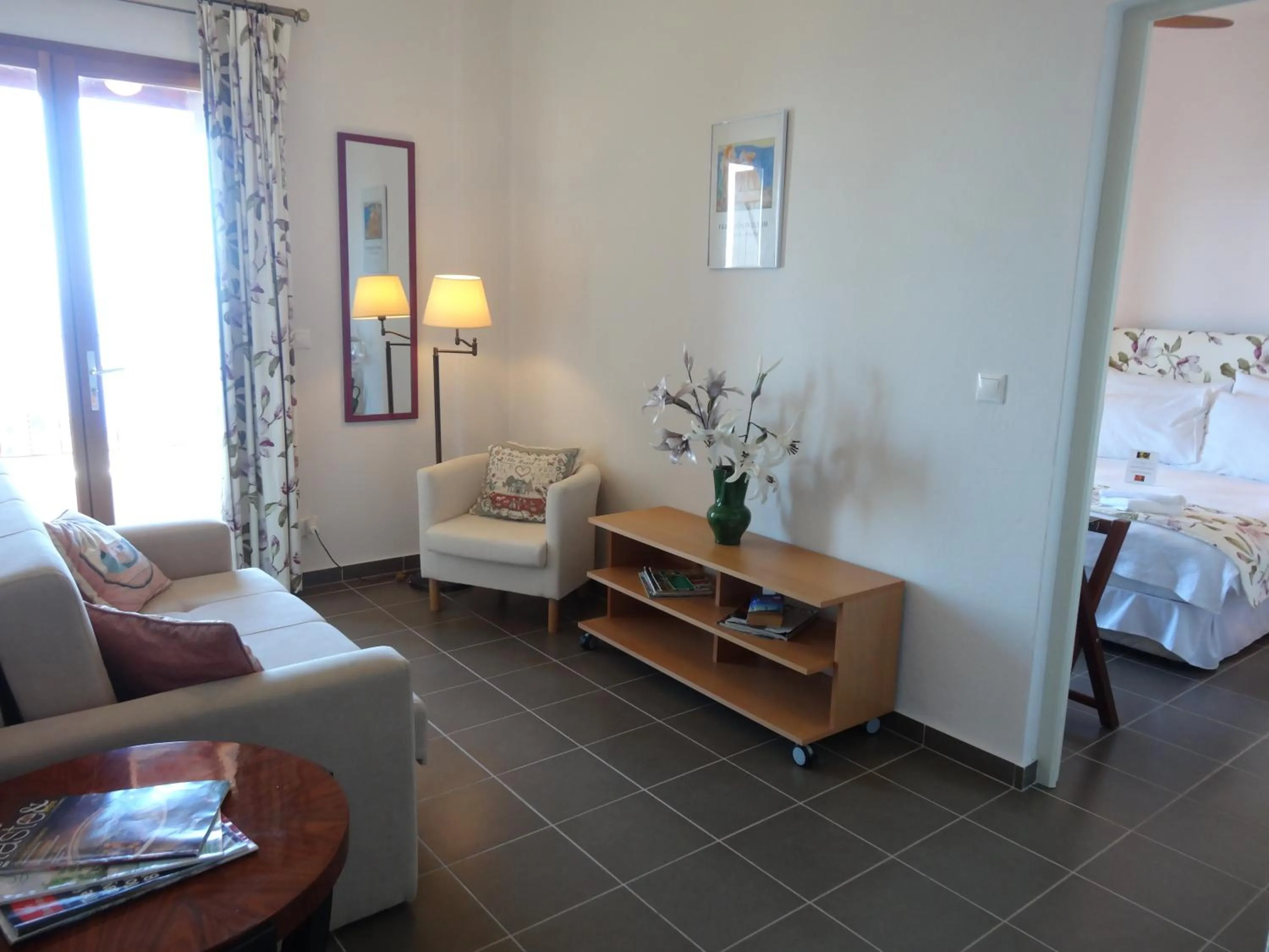 Seating area, Bed in Lagou Raxi Country Hotel