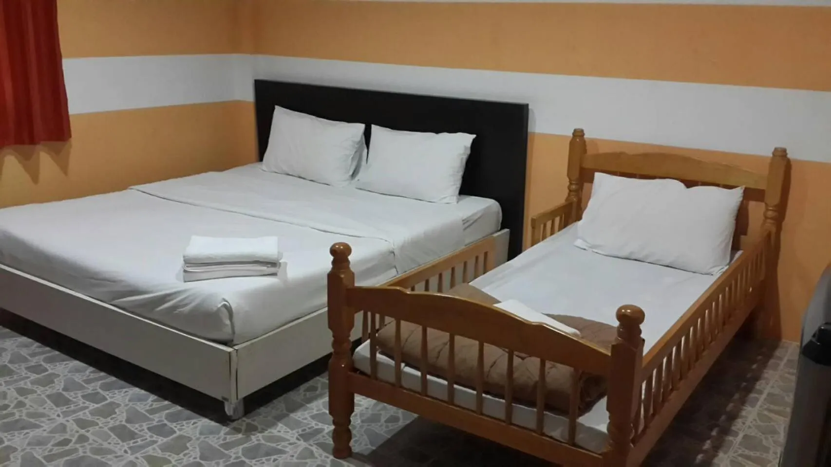 Bed in Chiang Rai Khuakrae Resort