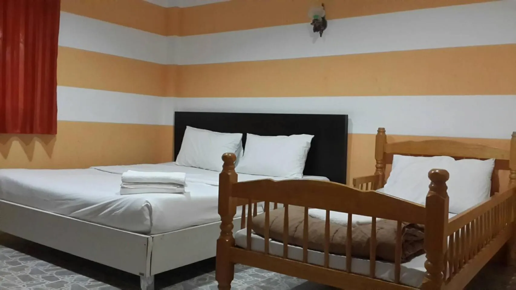 Bed in Chiang Rai Khuakrae Resort