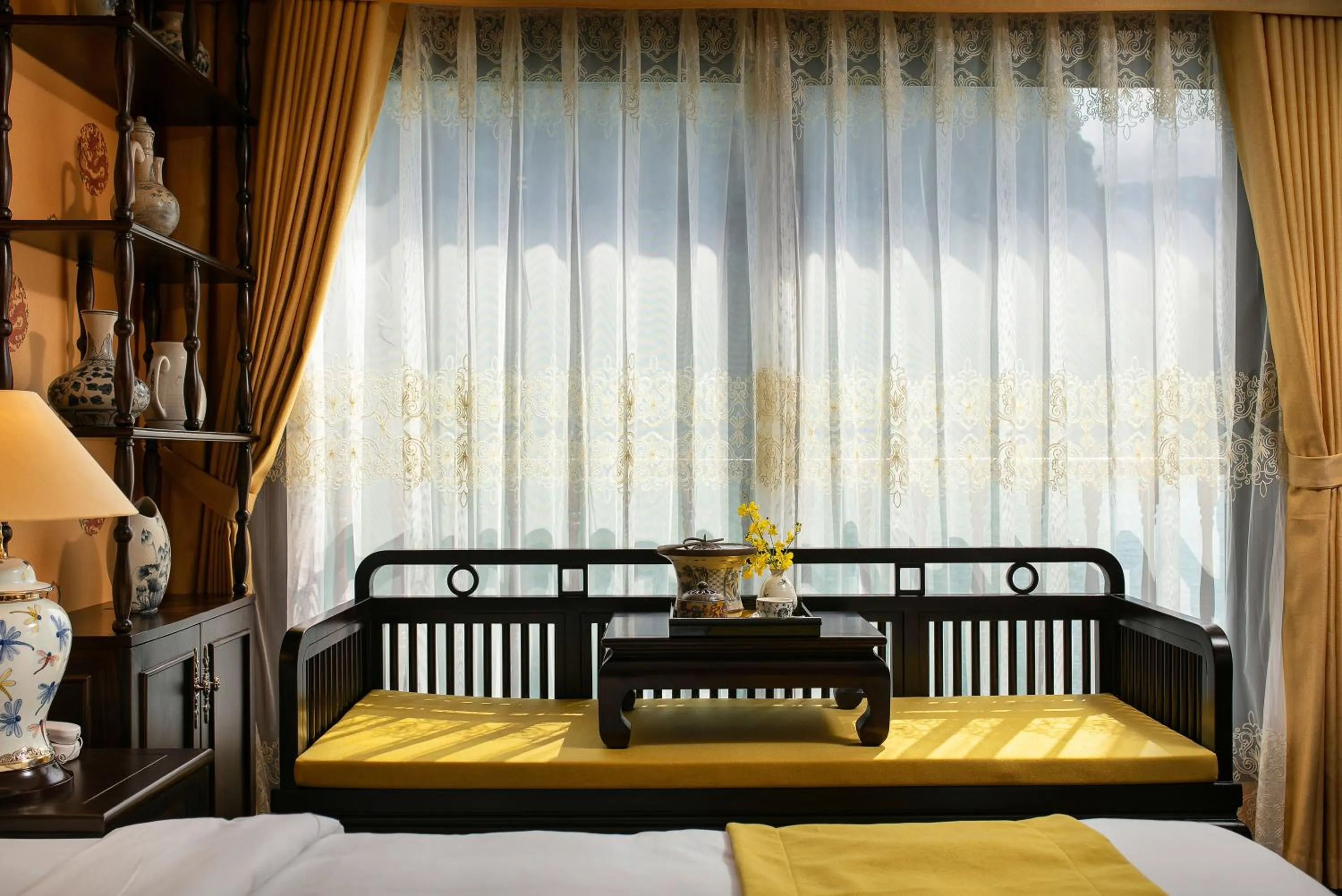 Seating area, Bed in Nostalgia Halong Cruise