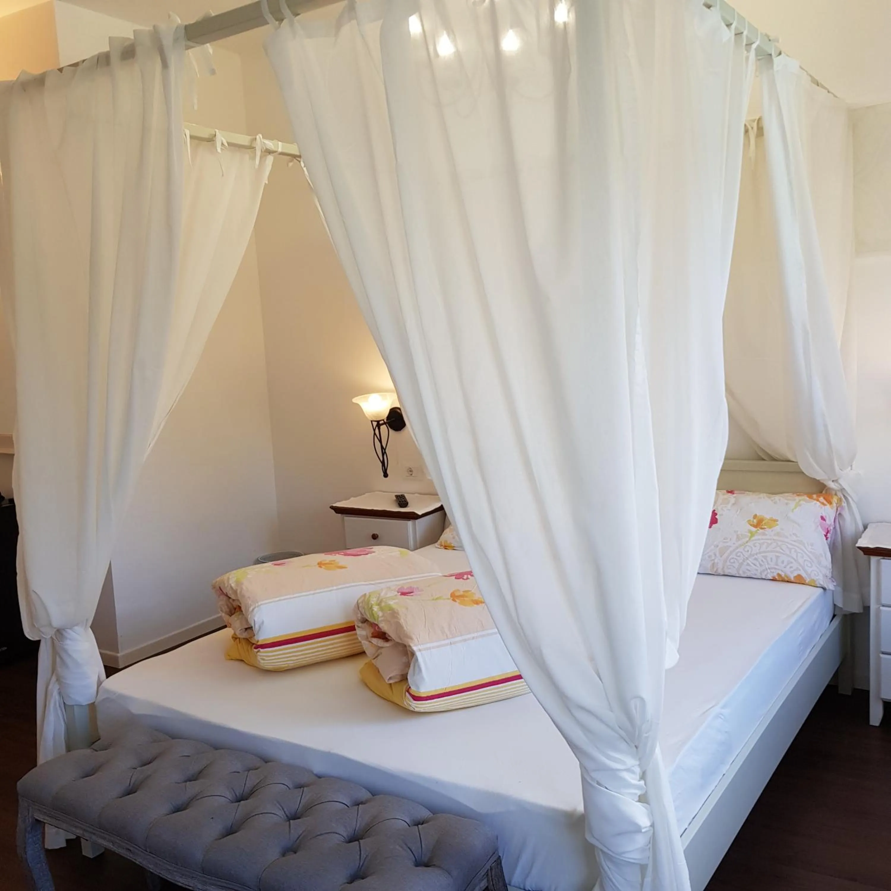 Bed in Garni Villa Tyrol - Adults Only