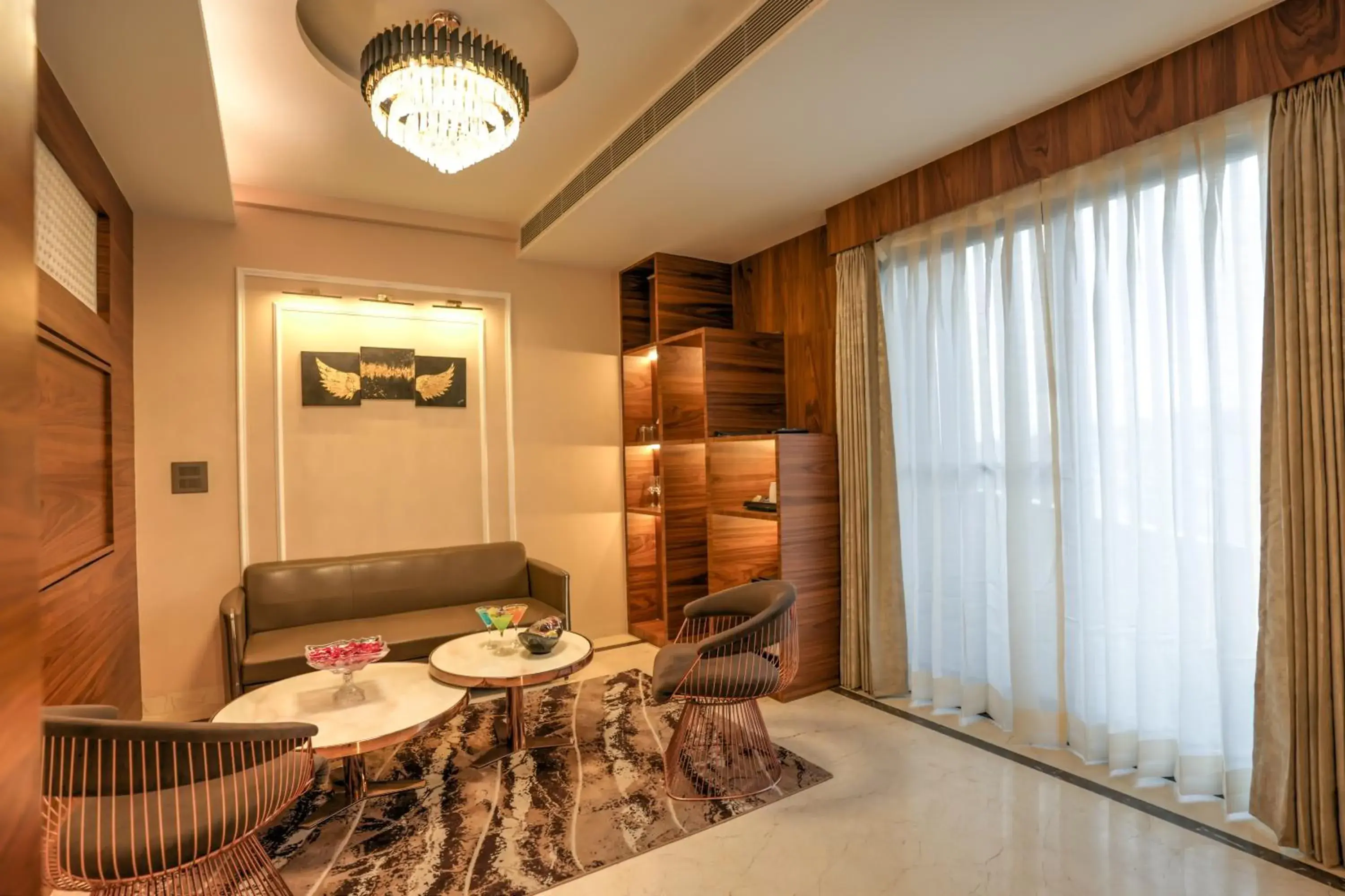 Living room, Bed in Hotel Rj Living room, Bed in Hotel Rj