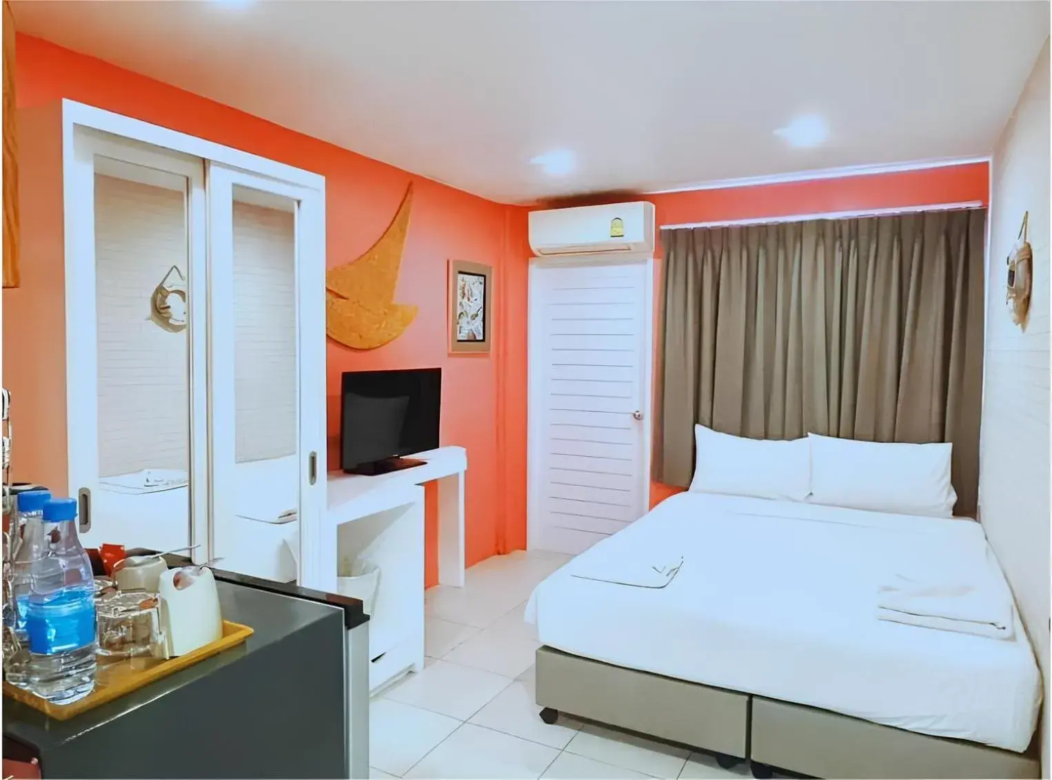 Bed in The Blue Pearl Kata Hotel Bed in The Blue Pearl Kata Hotel