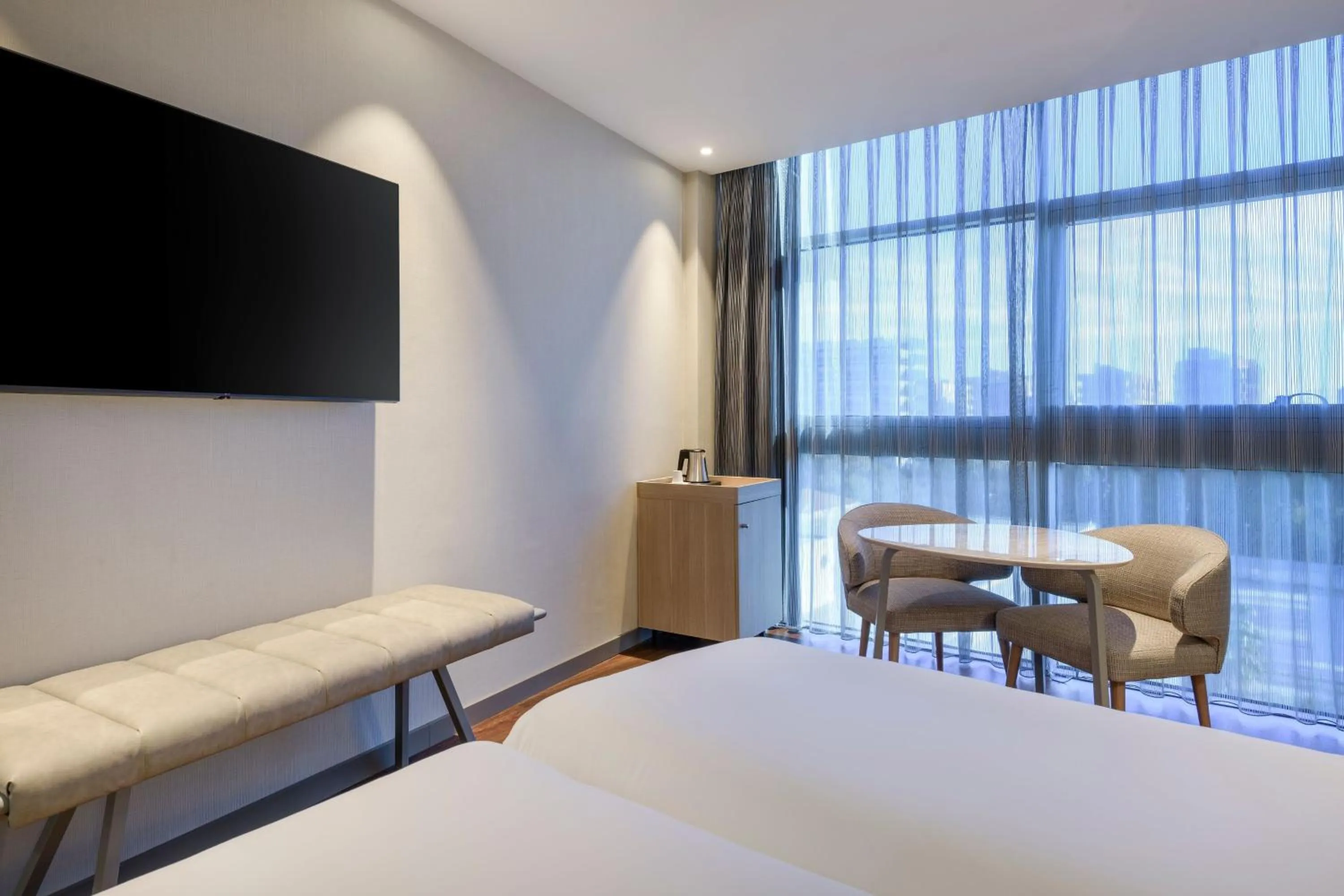 Photo of the whole room, Bed in AC Hotel Som by Marriott