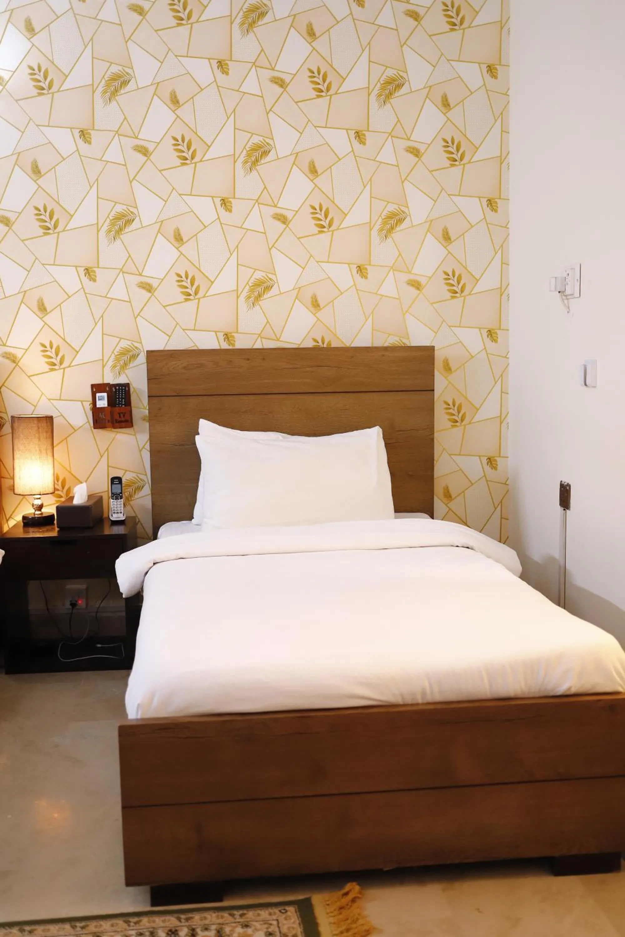 Bed in Waypoint Hotel