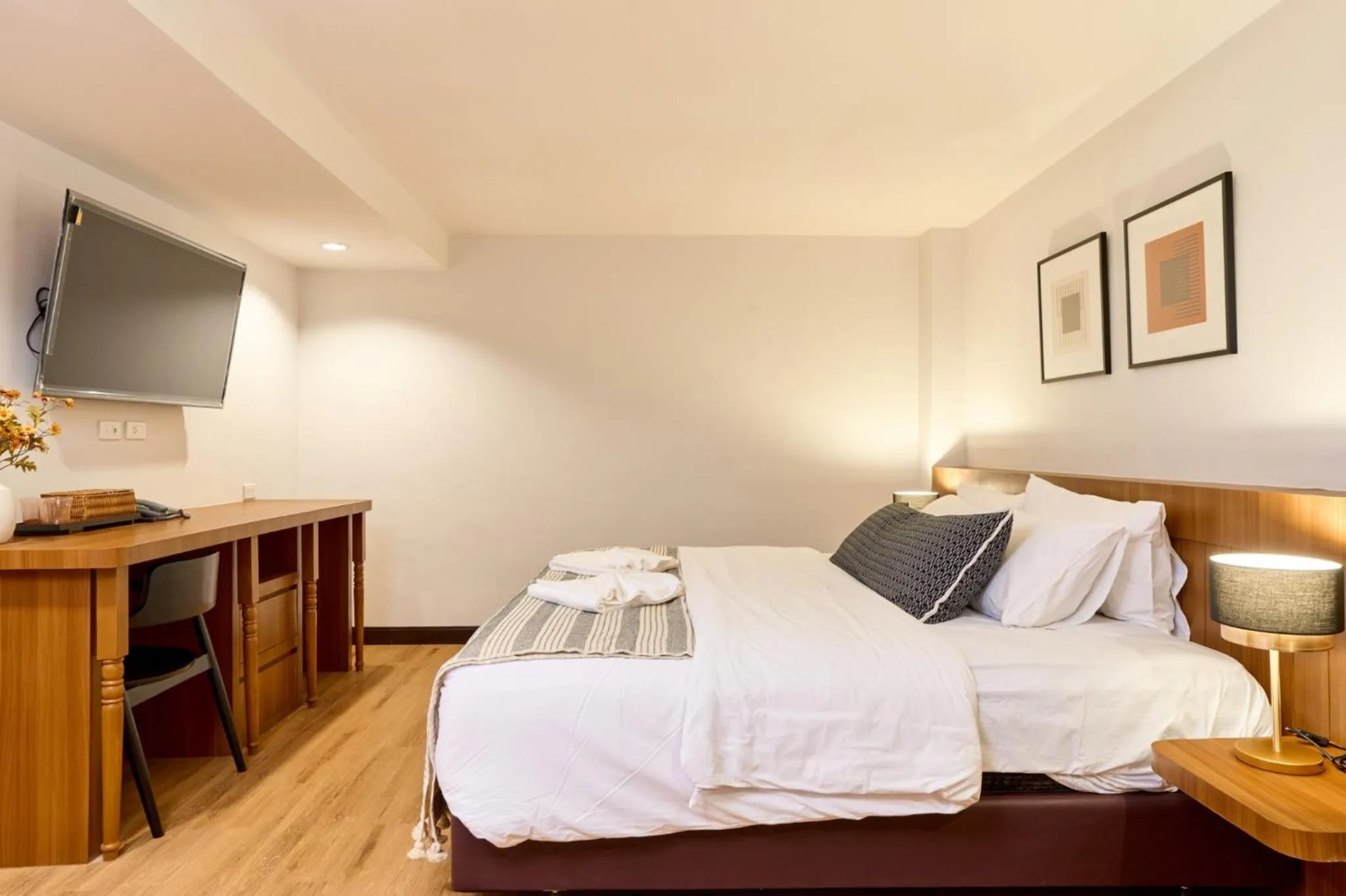 Bed in Be Phrasingh Hotel Chiang Mai