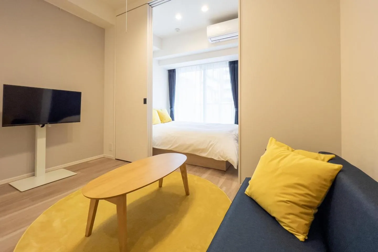 Communal lounge/ TV room, Bed in PARK AXIS Azumabashi