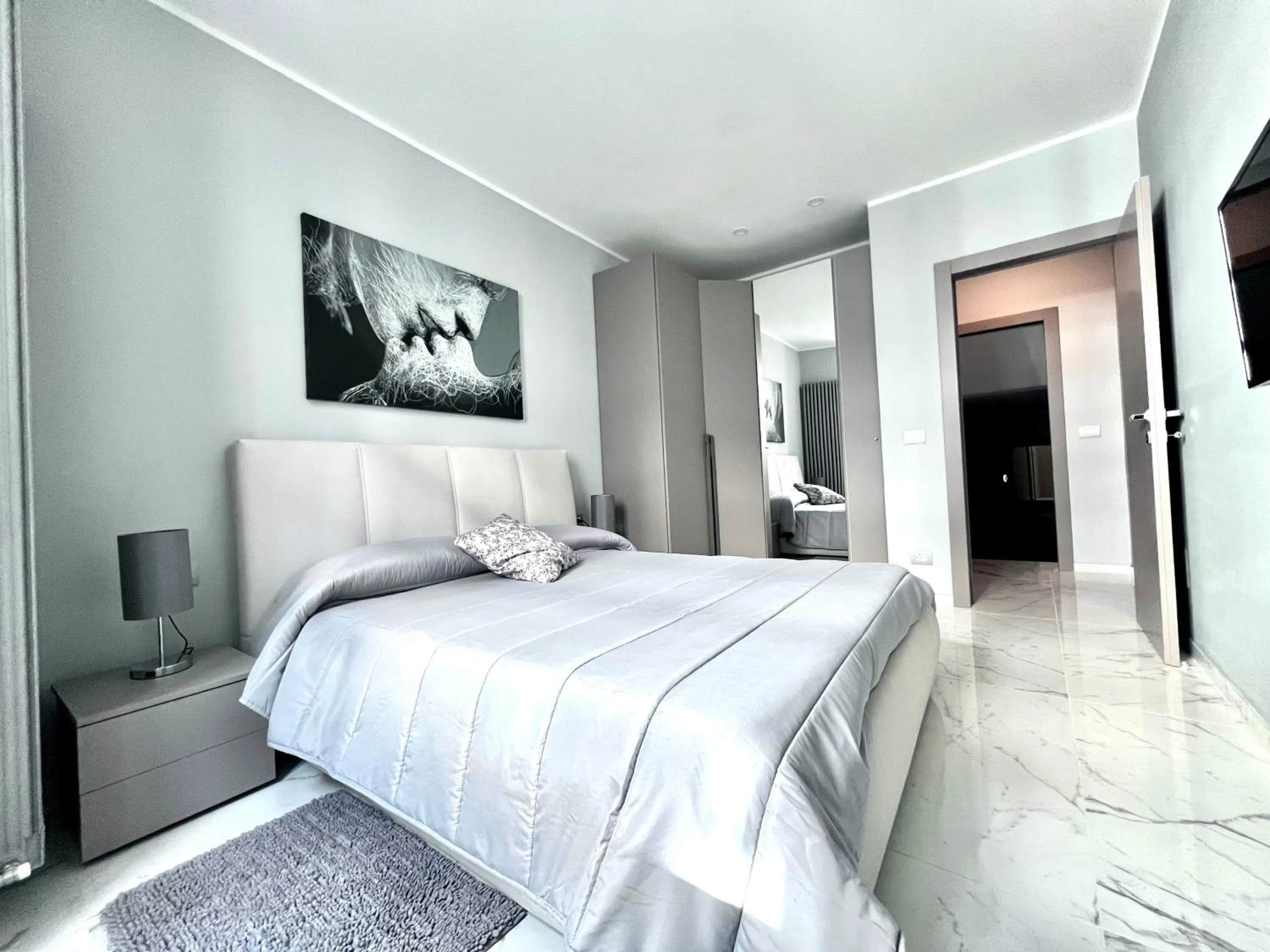 Bed in Le Porte luxury apartment
