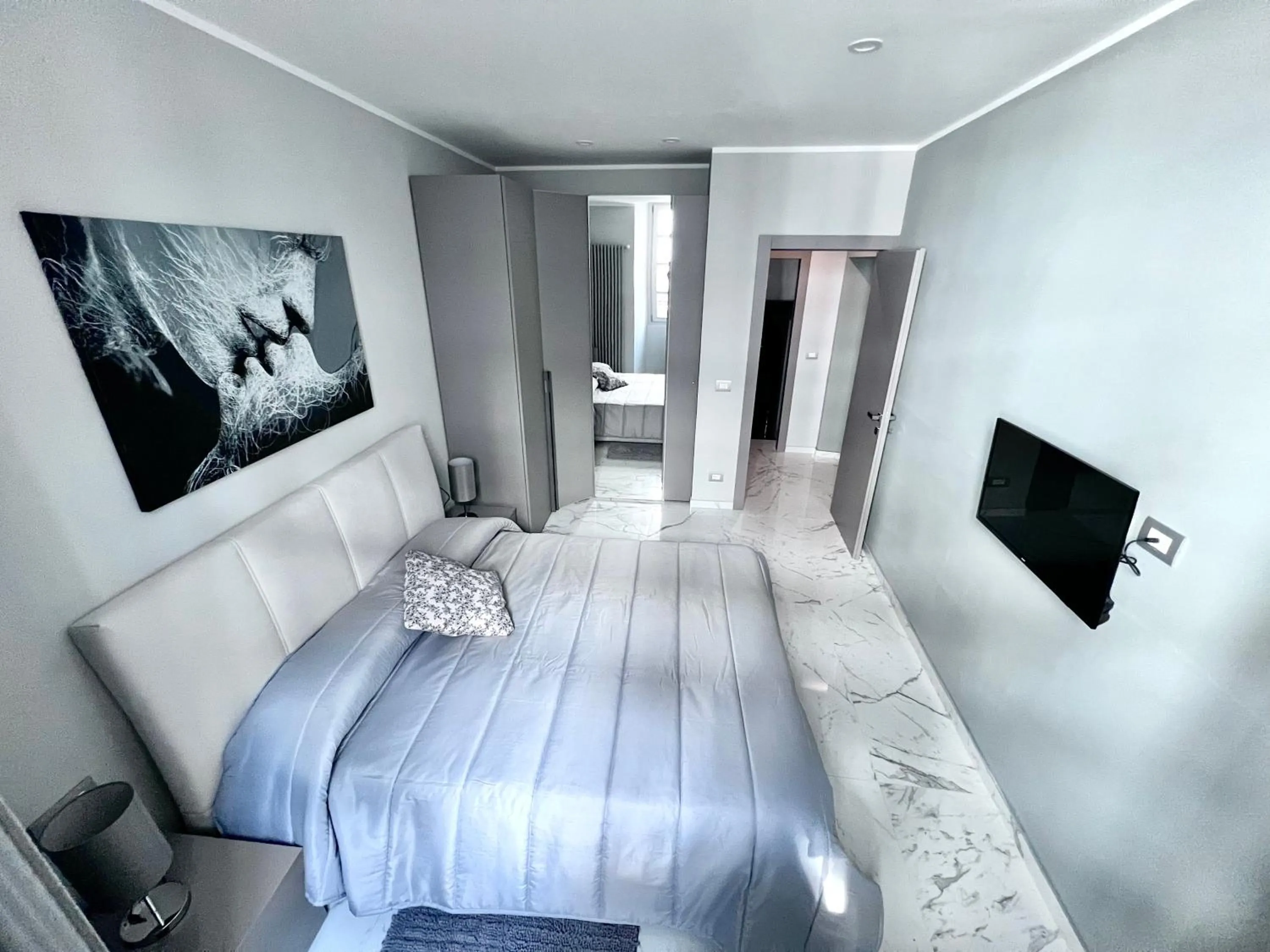 Bed in Le Porte luxury apartment