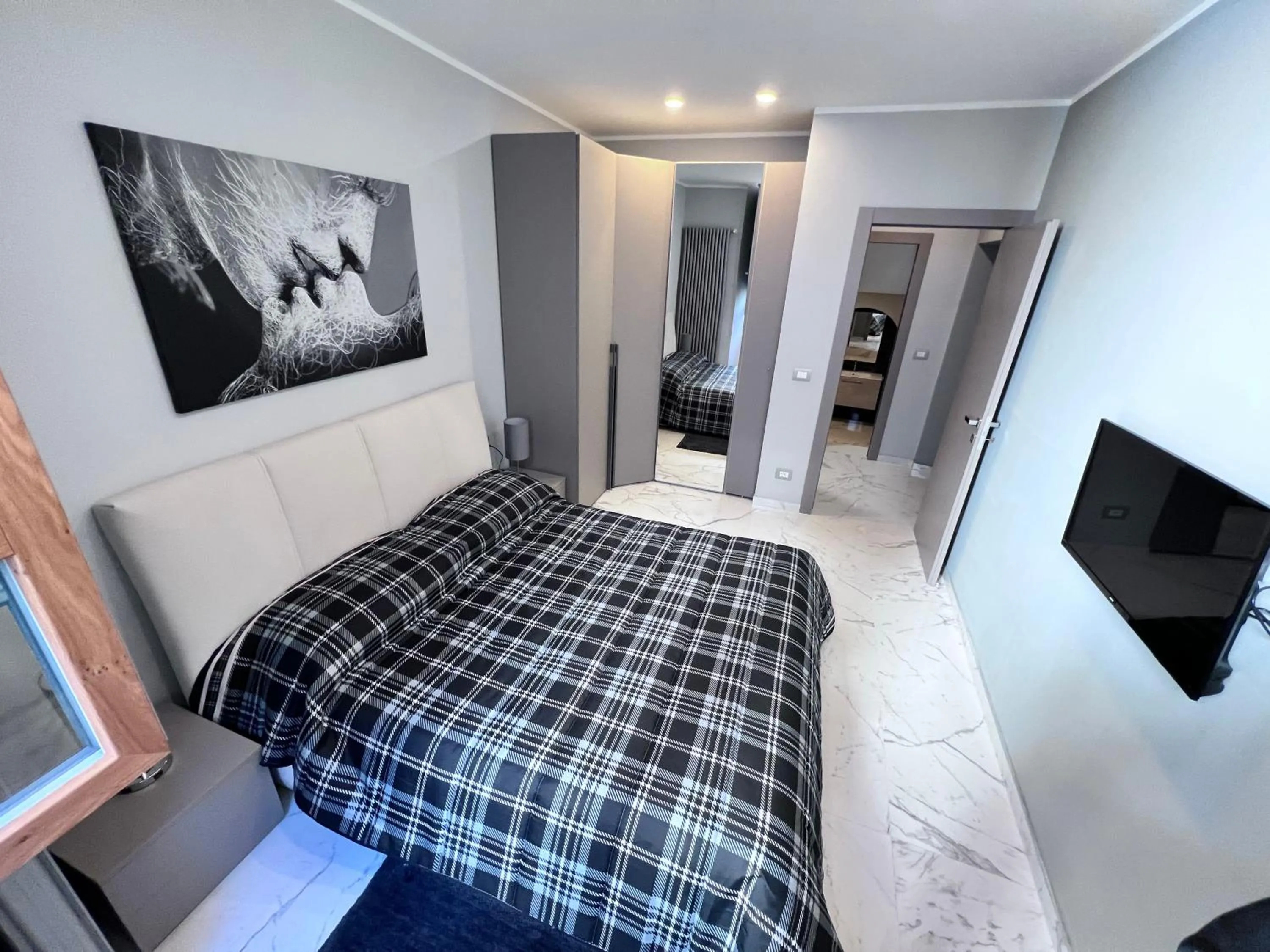 Bed in Le Porte luxury apartment