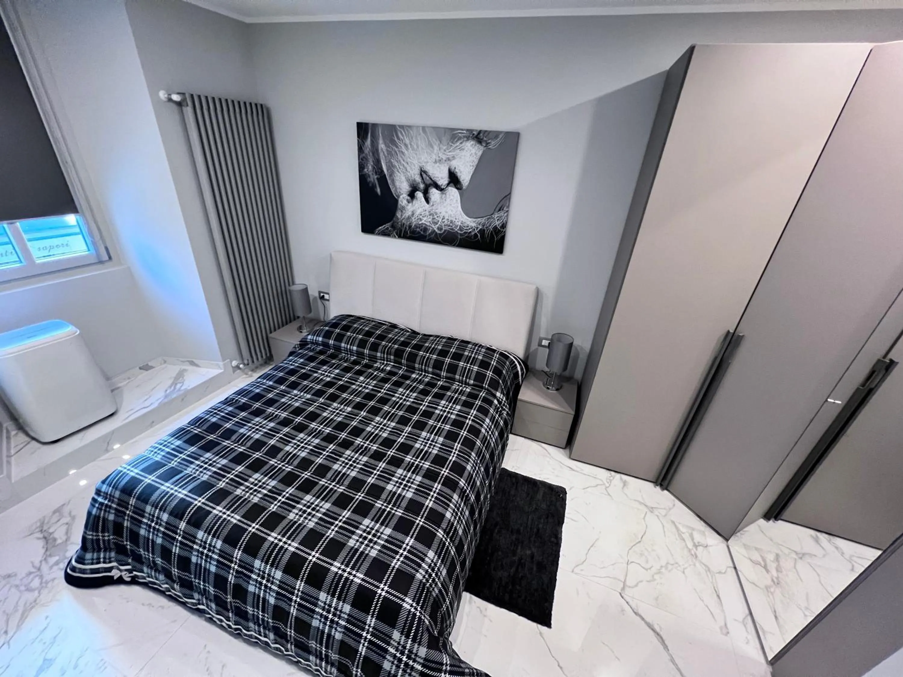 Bed in Le Porte luxury apartment