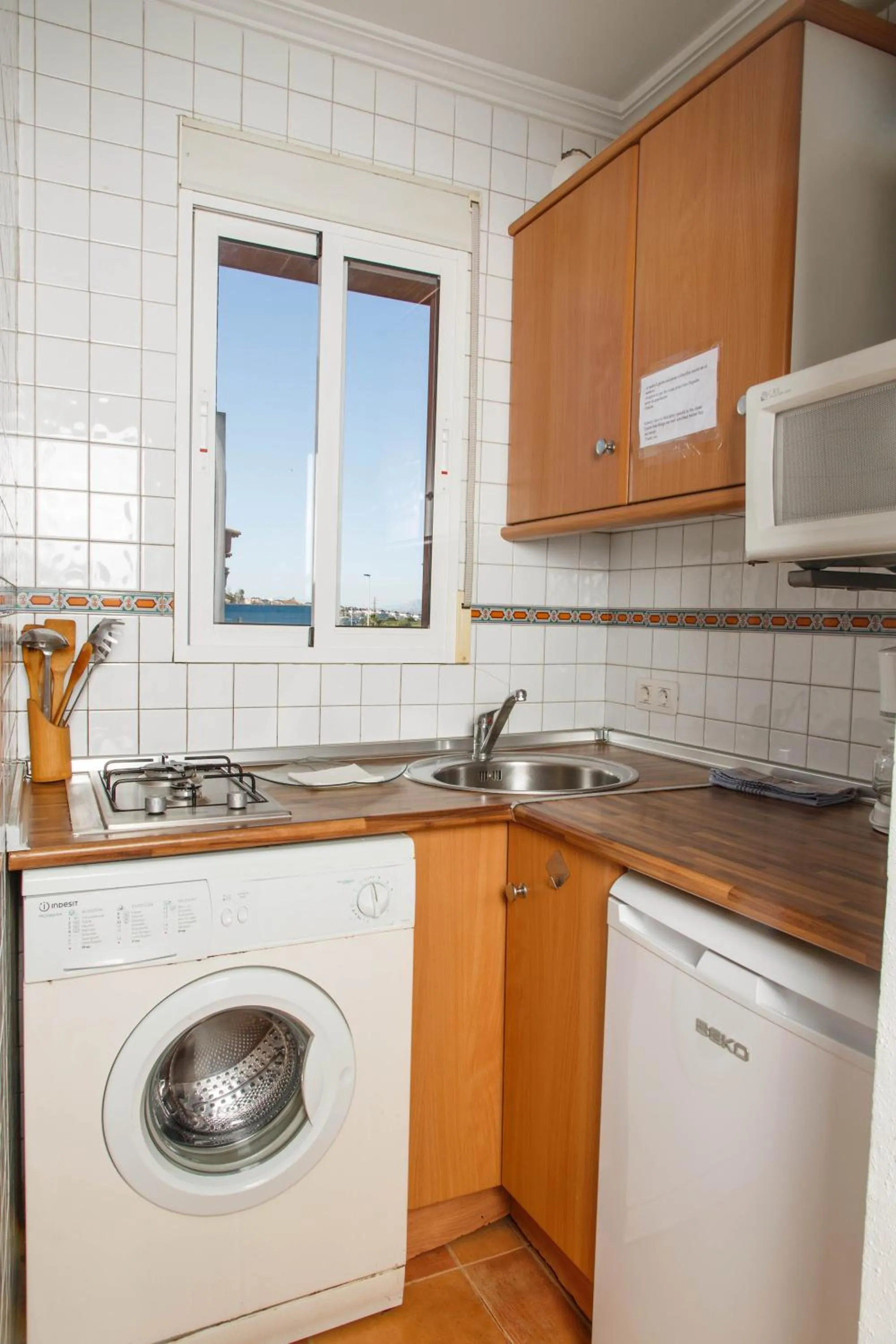 Kitchen or kitchenette in Laguna Salada Hotel Apartamento