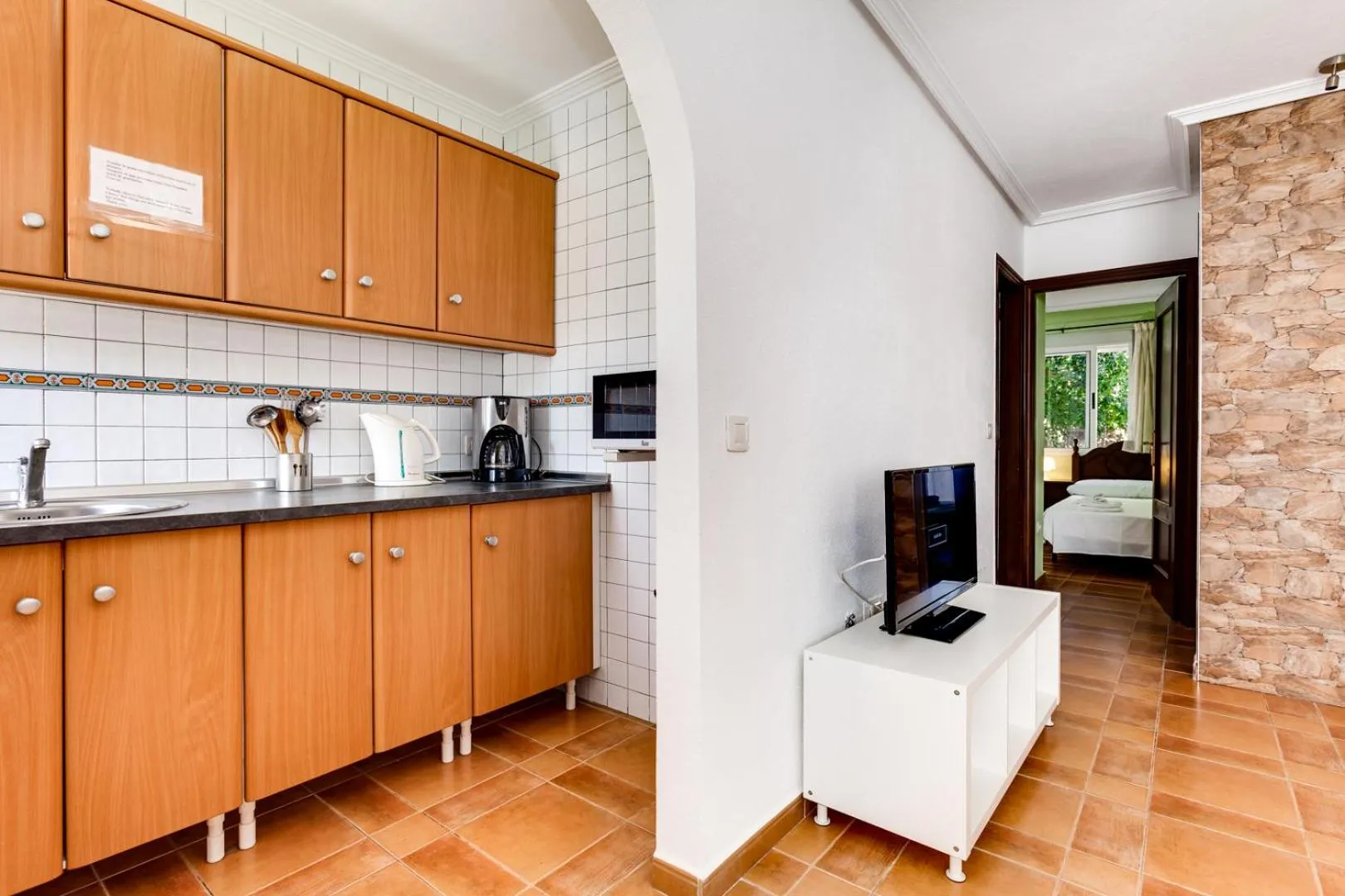 Kitchen or kitchenette in Laguna Salada Hotel Apartamento