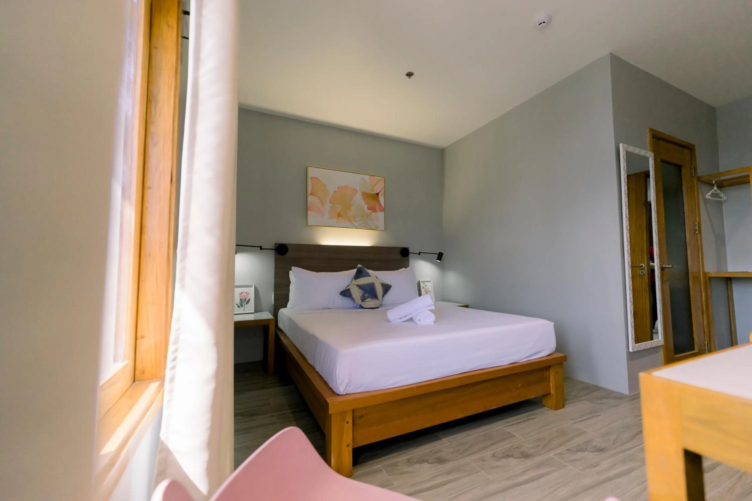 Bed in Madonna Hometel and Suites New Pandan