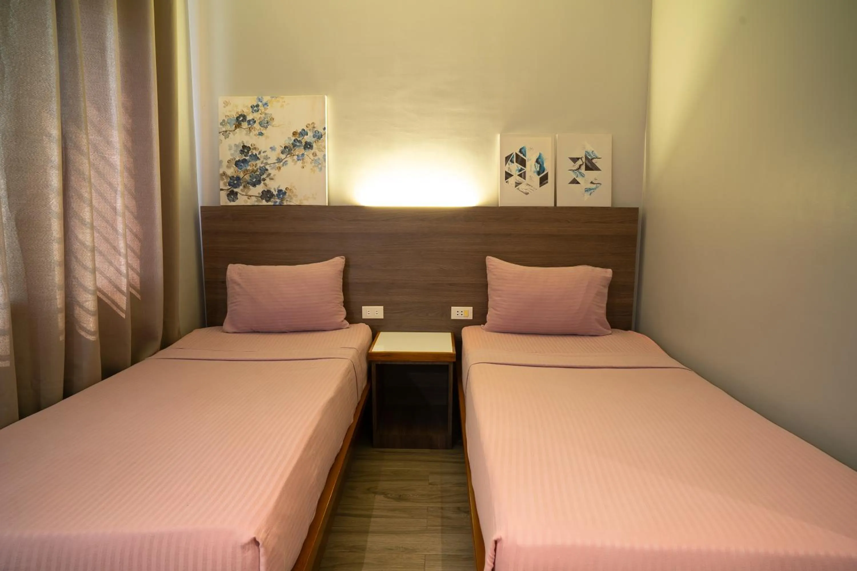 Bed in Madonna Hometel and Suites New Pandan