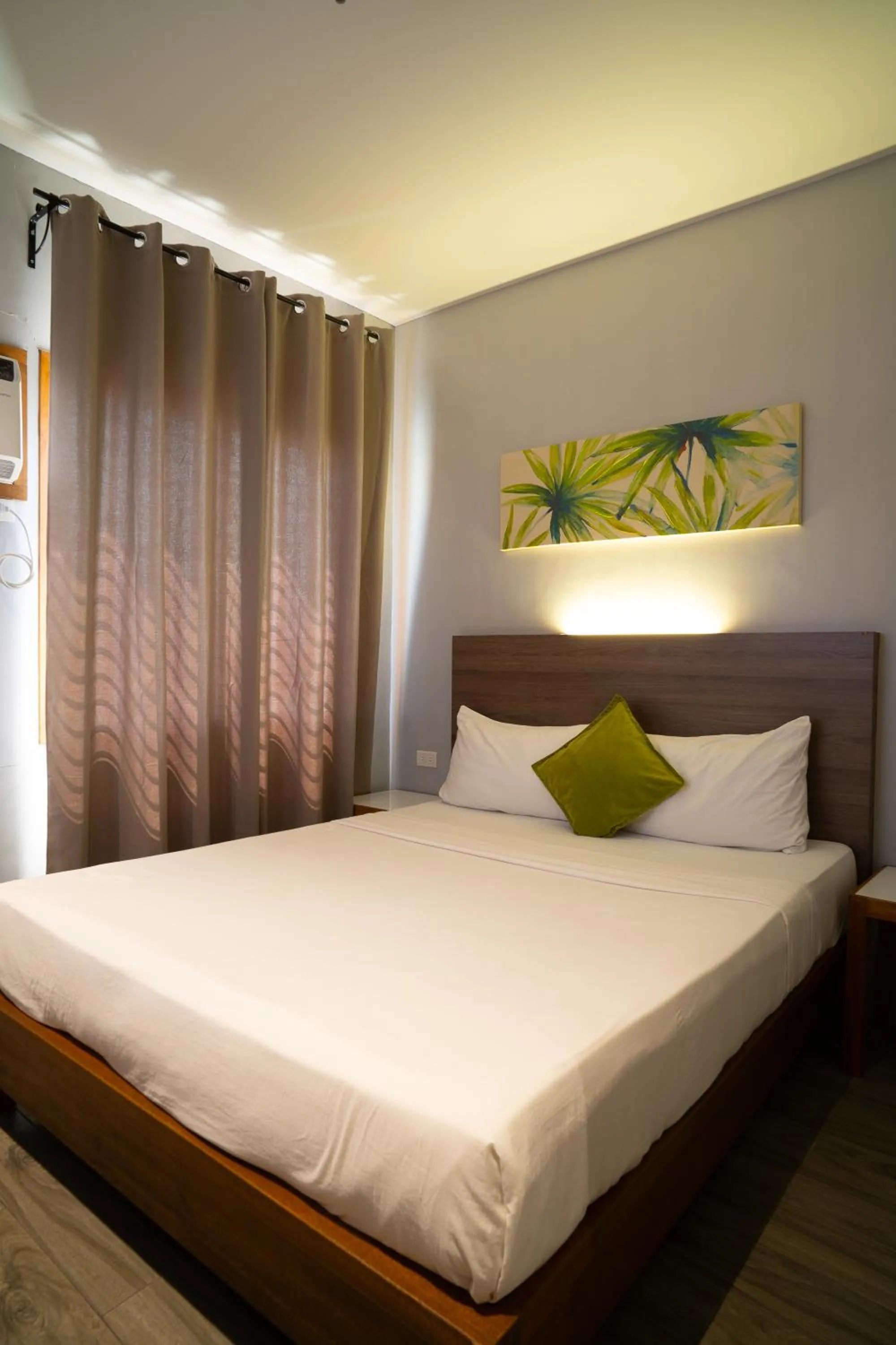 Bed in Madonna Hometel and Suites New Pandan