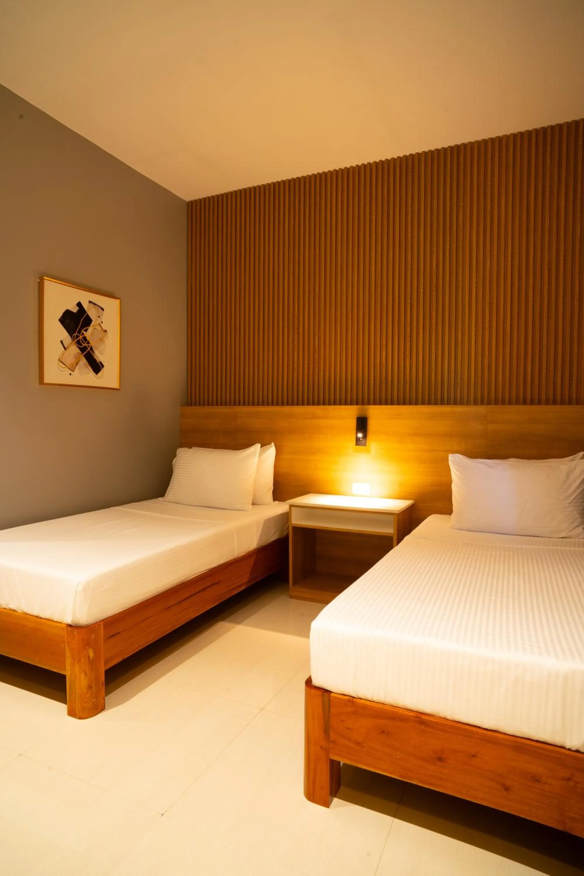 Bed in Madonna Hometel and Suites New Pandan