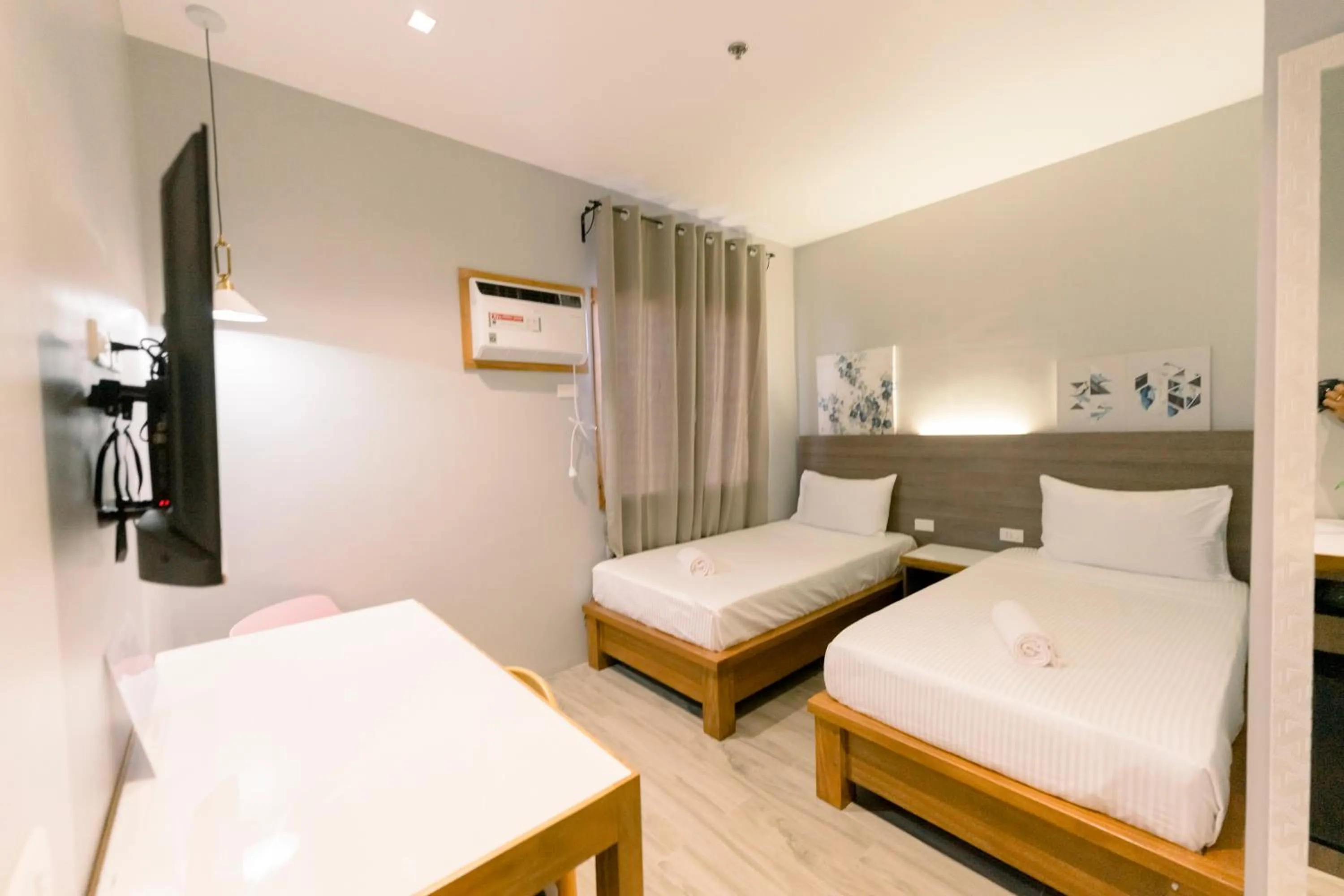 Bed in Madonna Hometel and Suites New Pandan