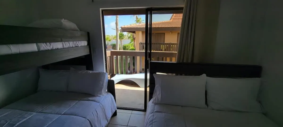 Bed in Tiki Condo 261