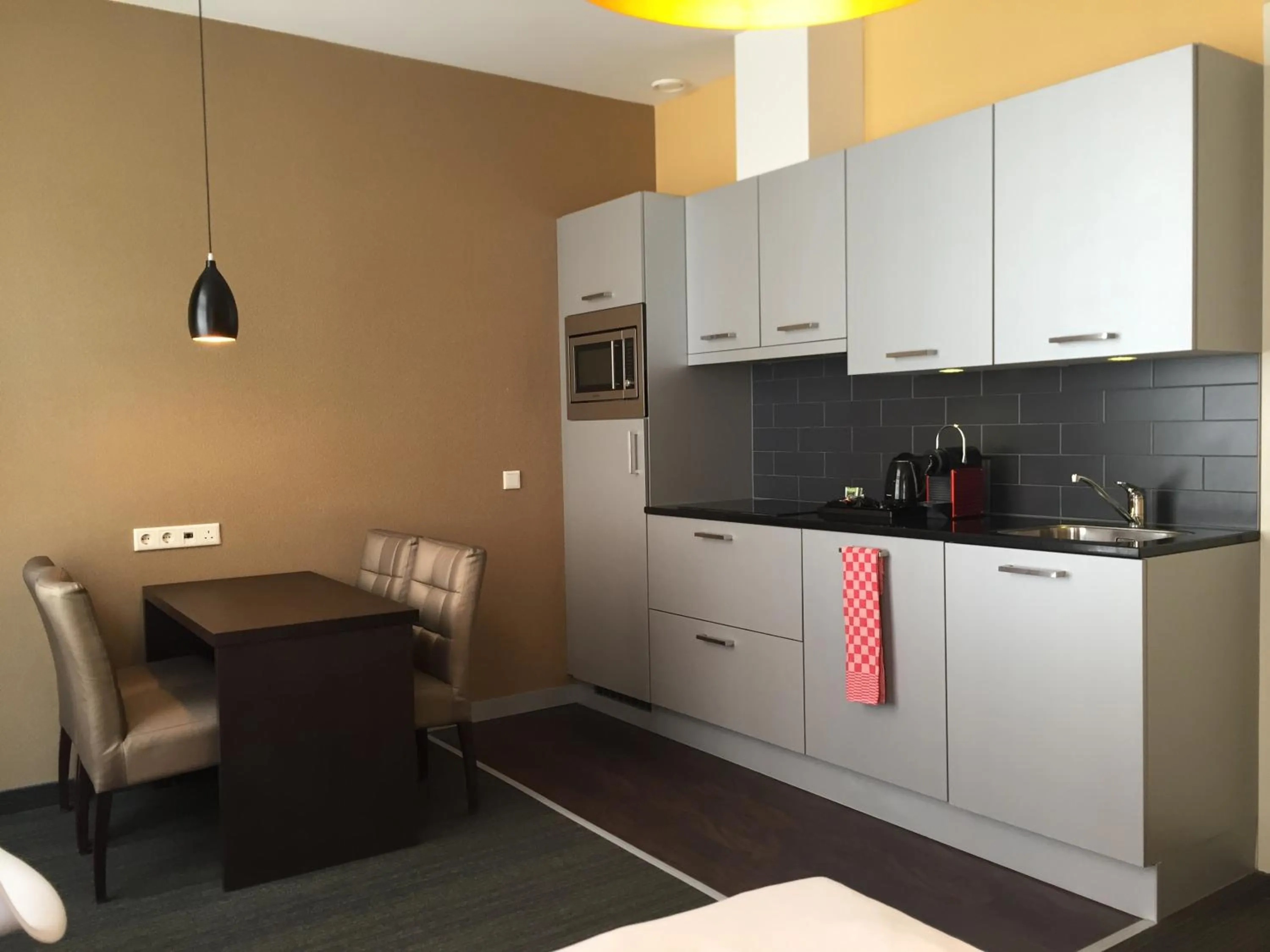 Kitchen or kitchenette in Golden Mansion Aparthotel