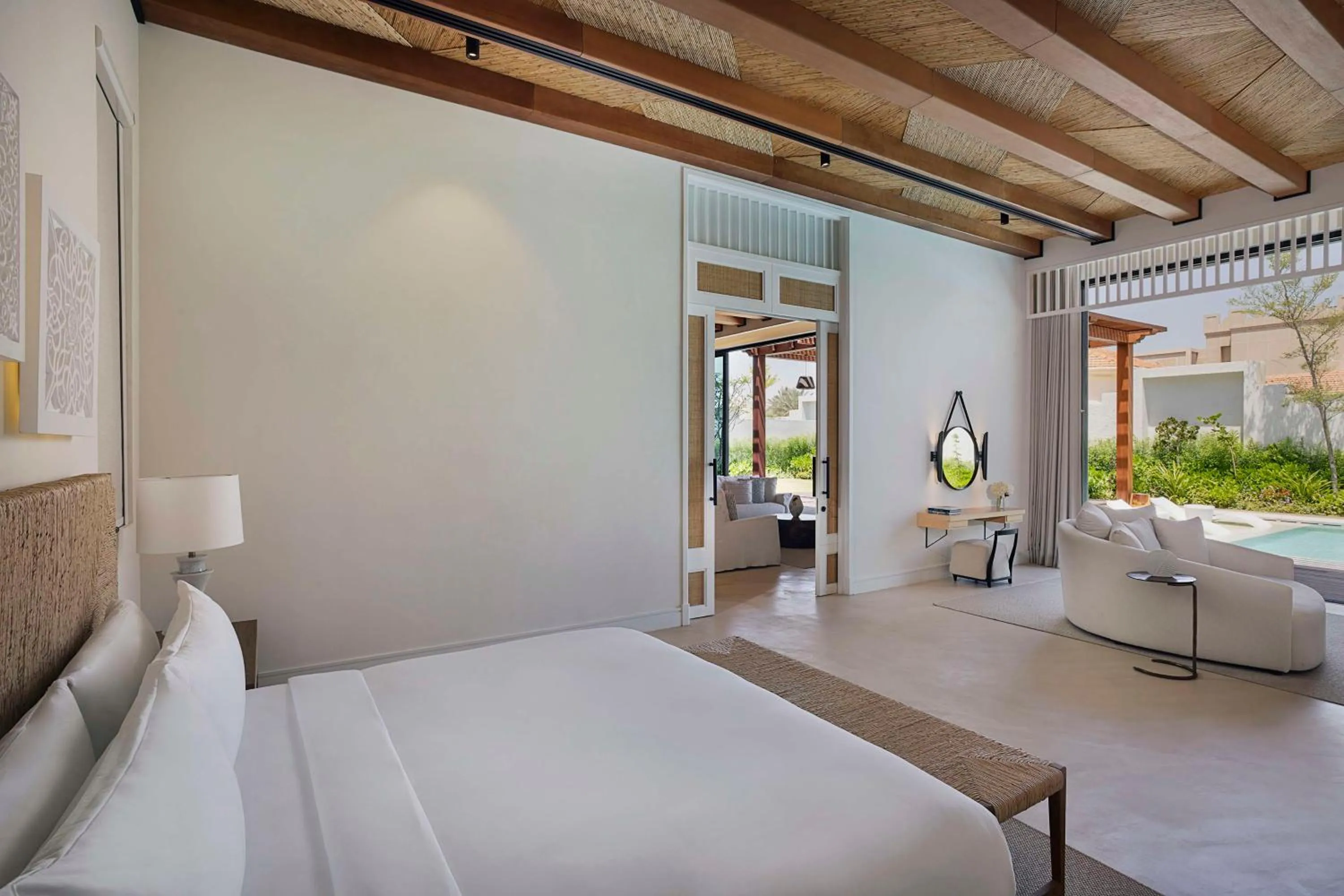 Living room, Bed in Maysan Doha, LXR Hotels & Resorts