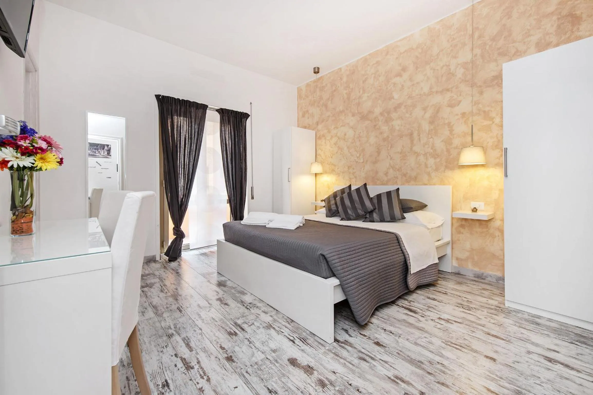 Photo of the whole room, Bed in De Guestibus