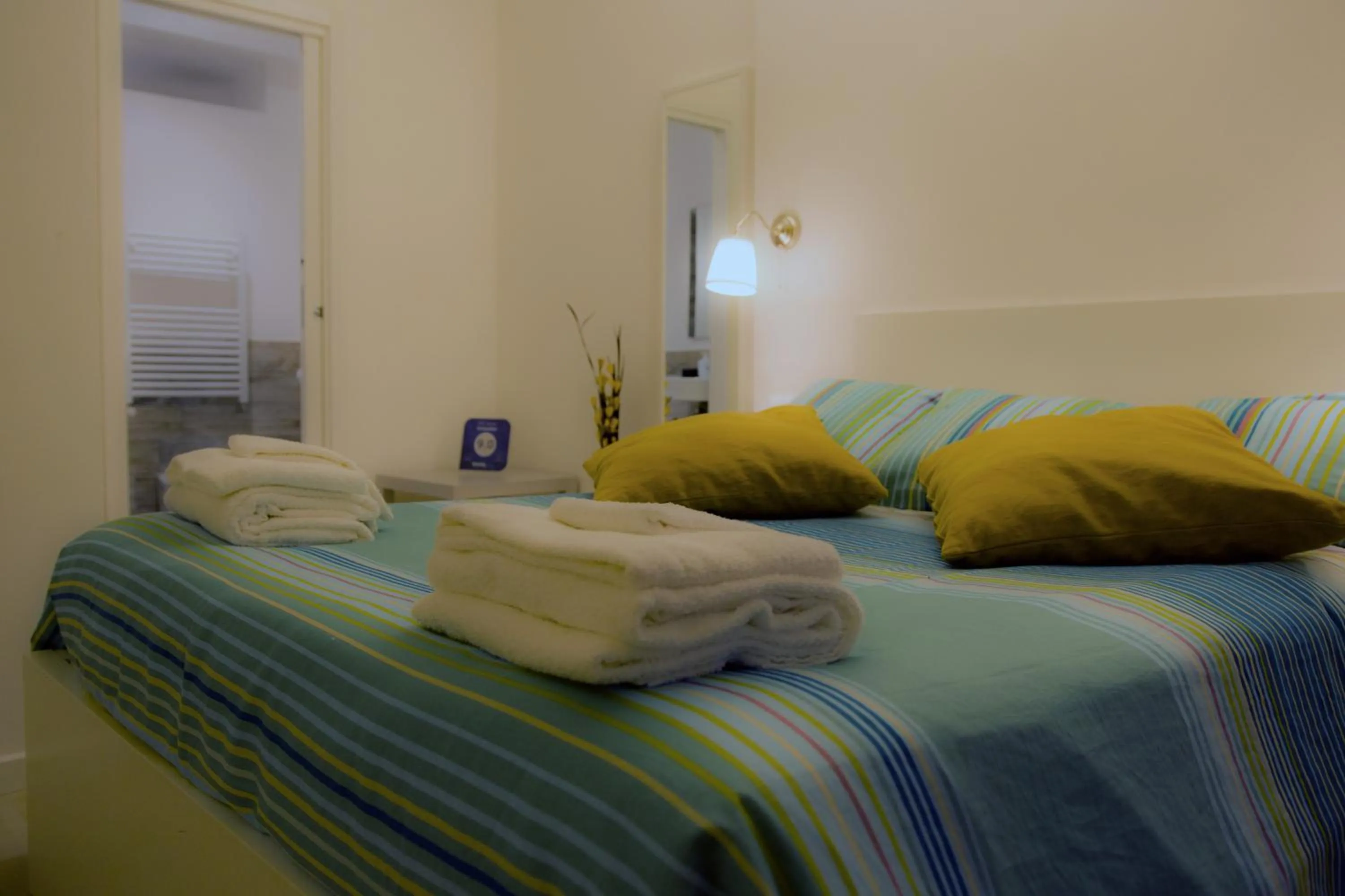 Photo of the whole room, Bed in De Guestibus