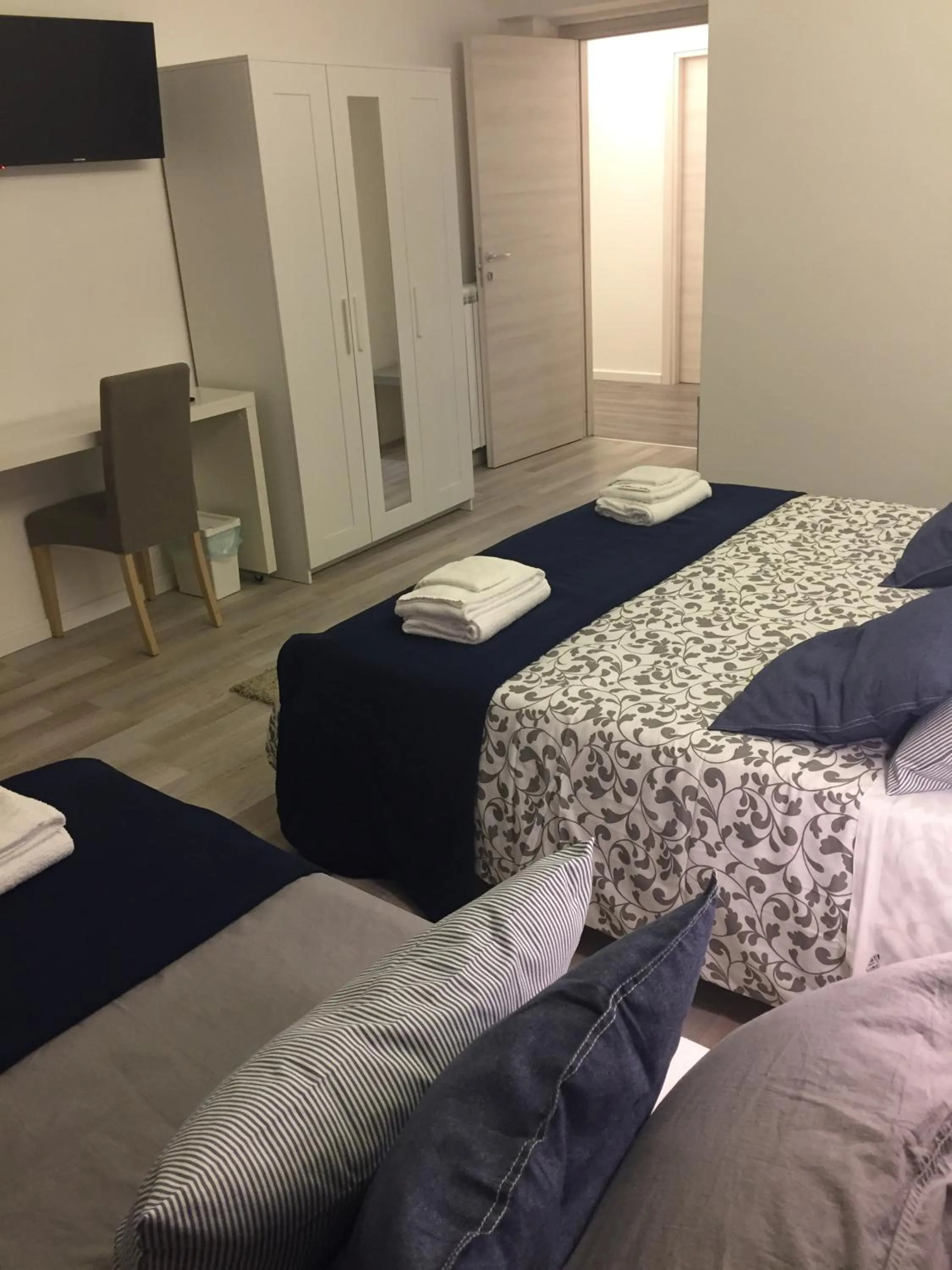 Photo of the whole room, Bed in De Guestibus