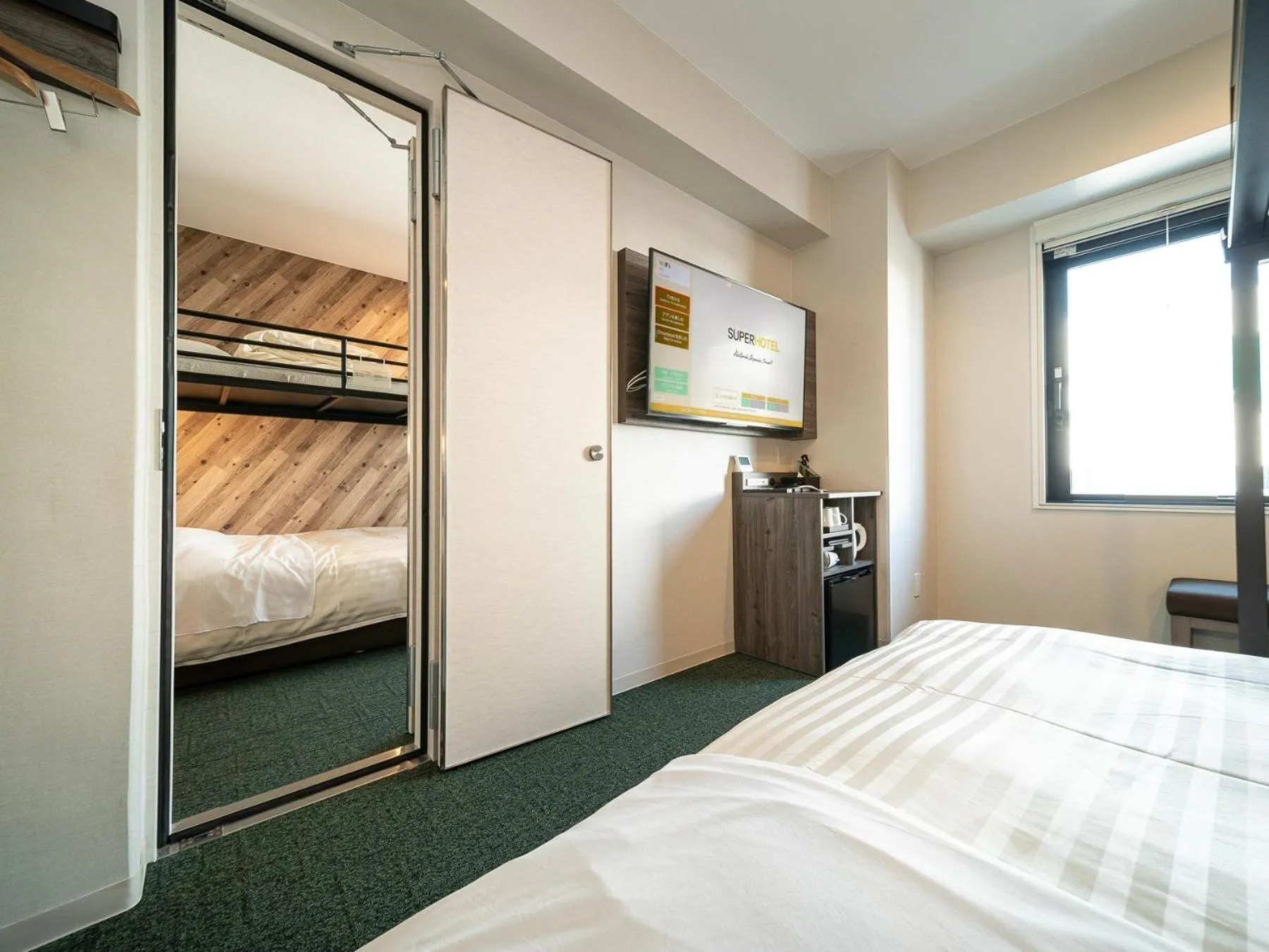 Bed in Super Hotel Kumamoto Ekimae Natural Hot Springs