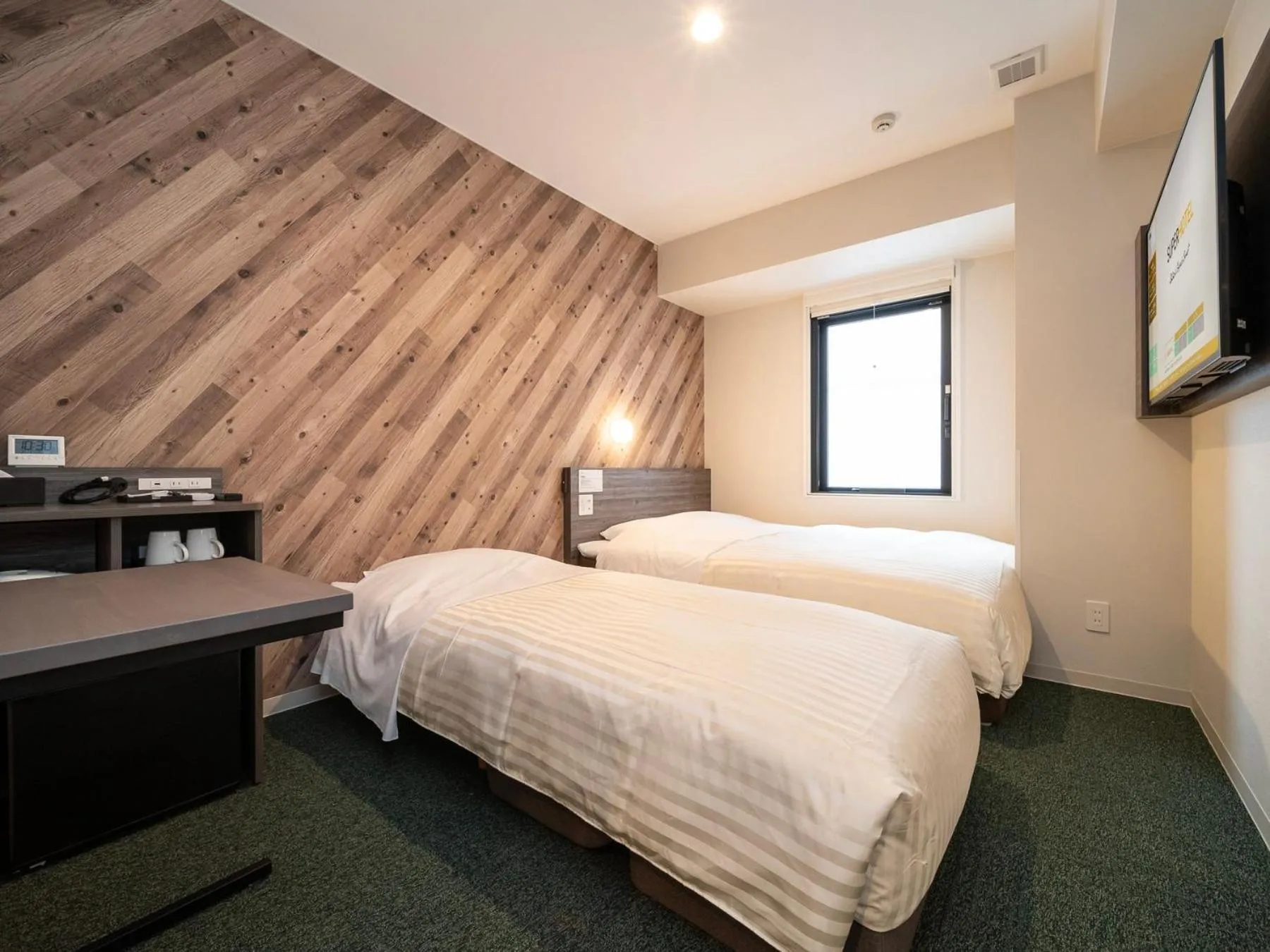 Bed in Super Hotel Kumamoto Ekimae Natural Hot Springs