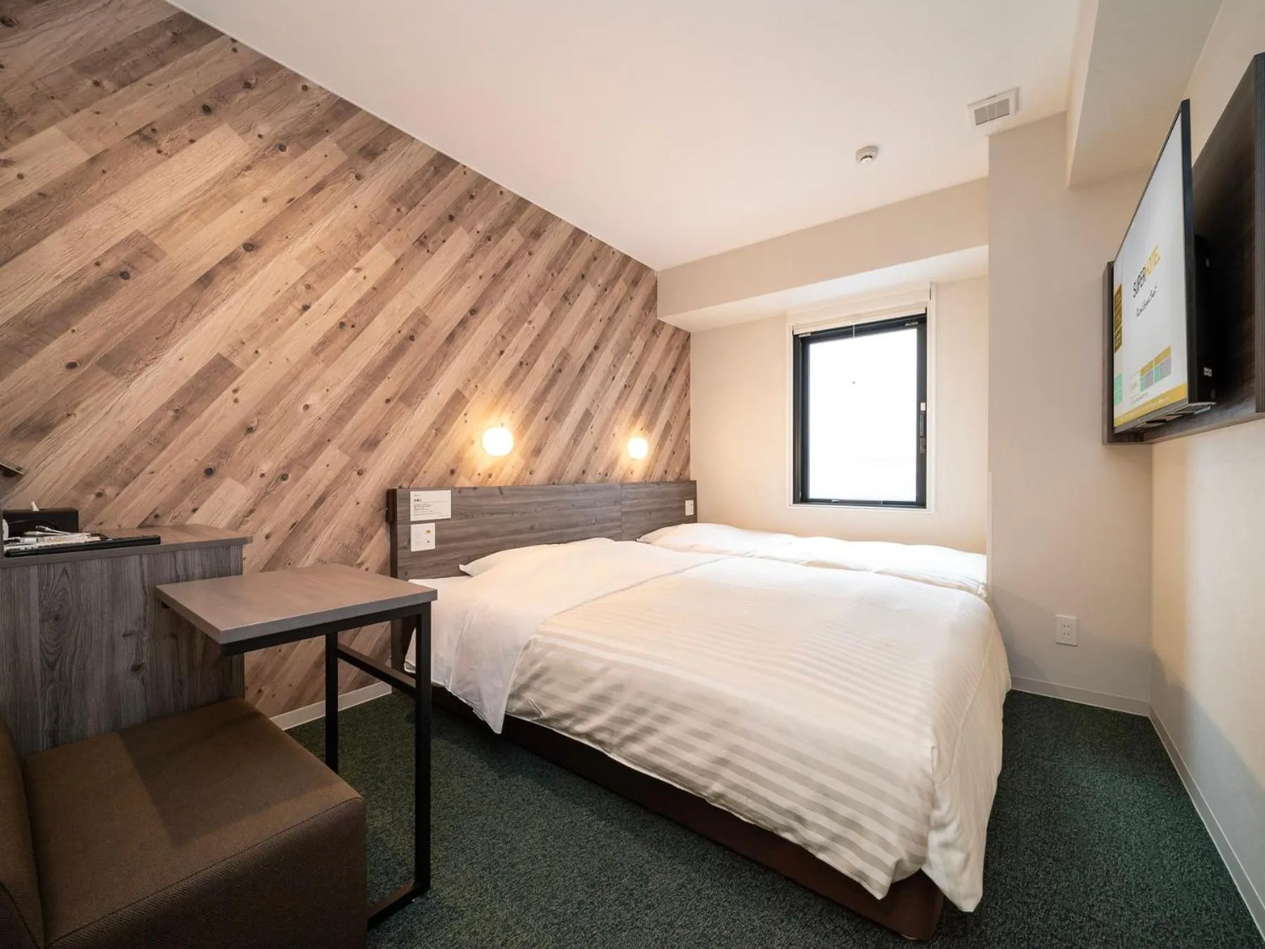 Bed in Super Hotel Kumamoto Ekimae Natural Hot Springs