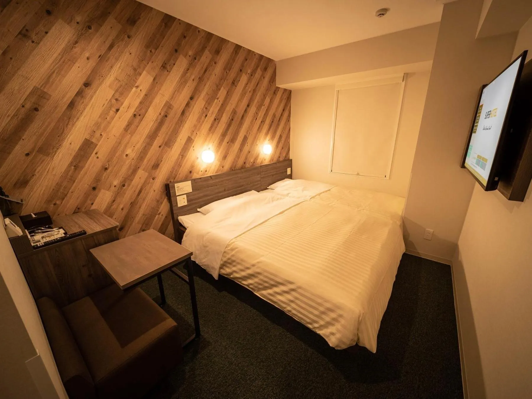 Bed in Super Hotel Kumamoto Ekimae Natural Hot Springs