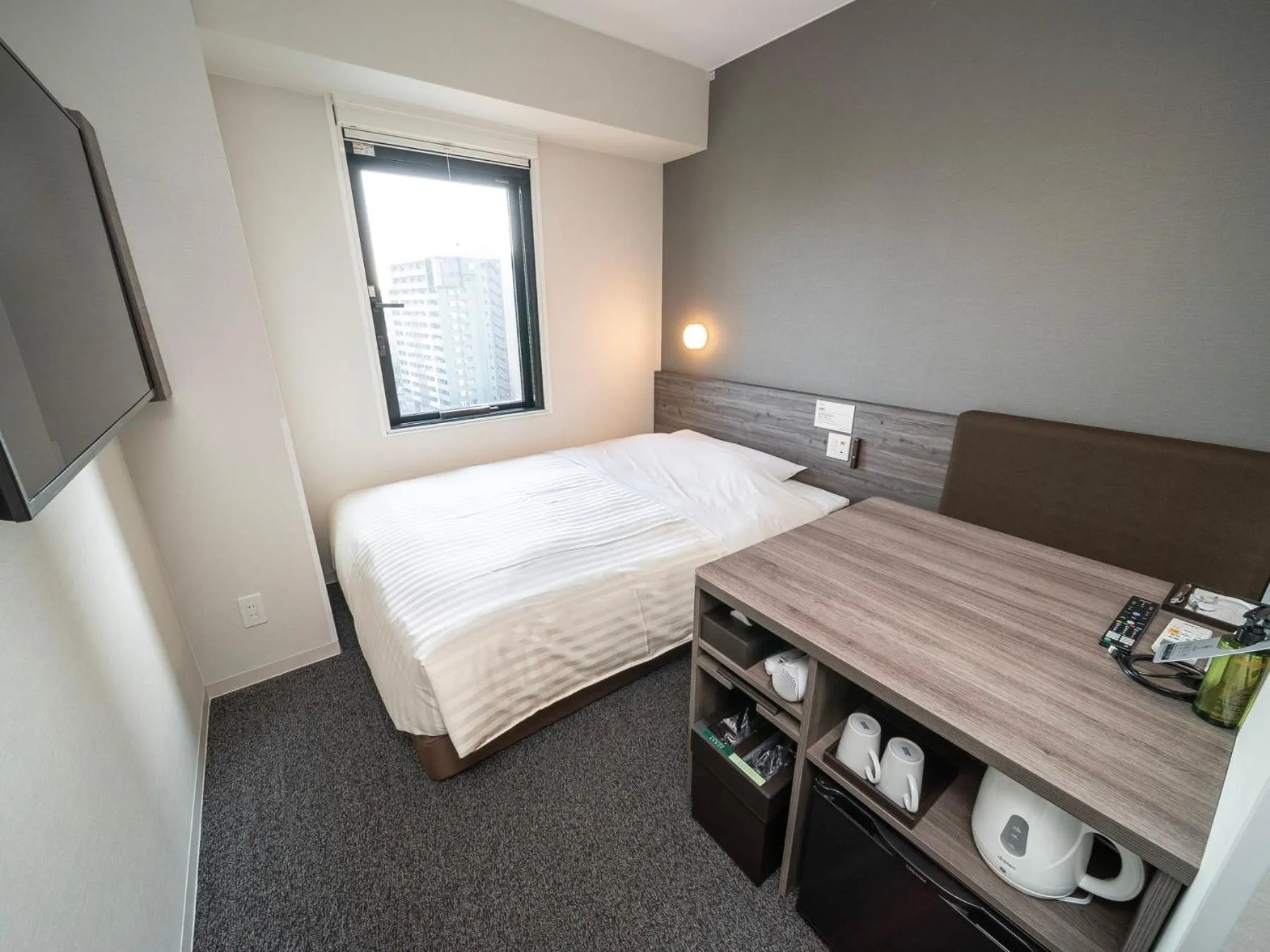 Photo of the whole room, Bed in Super Hotel Kumamoto Ekimae Natural Hot Springs