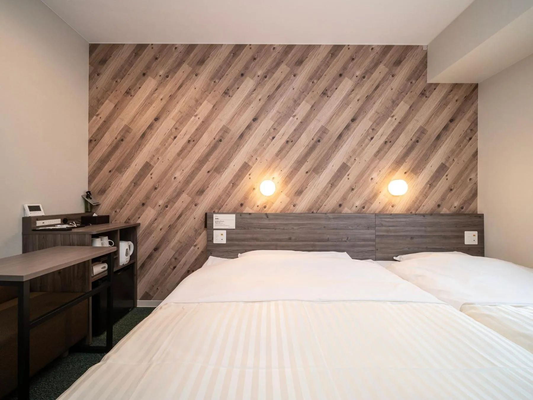 Bed in Super Hotel Kumamoto Ekimae Natural Hot Springs